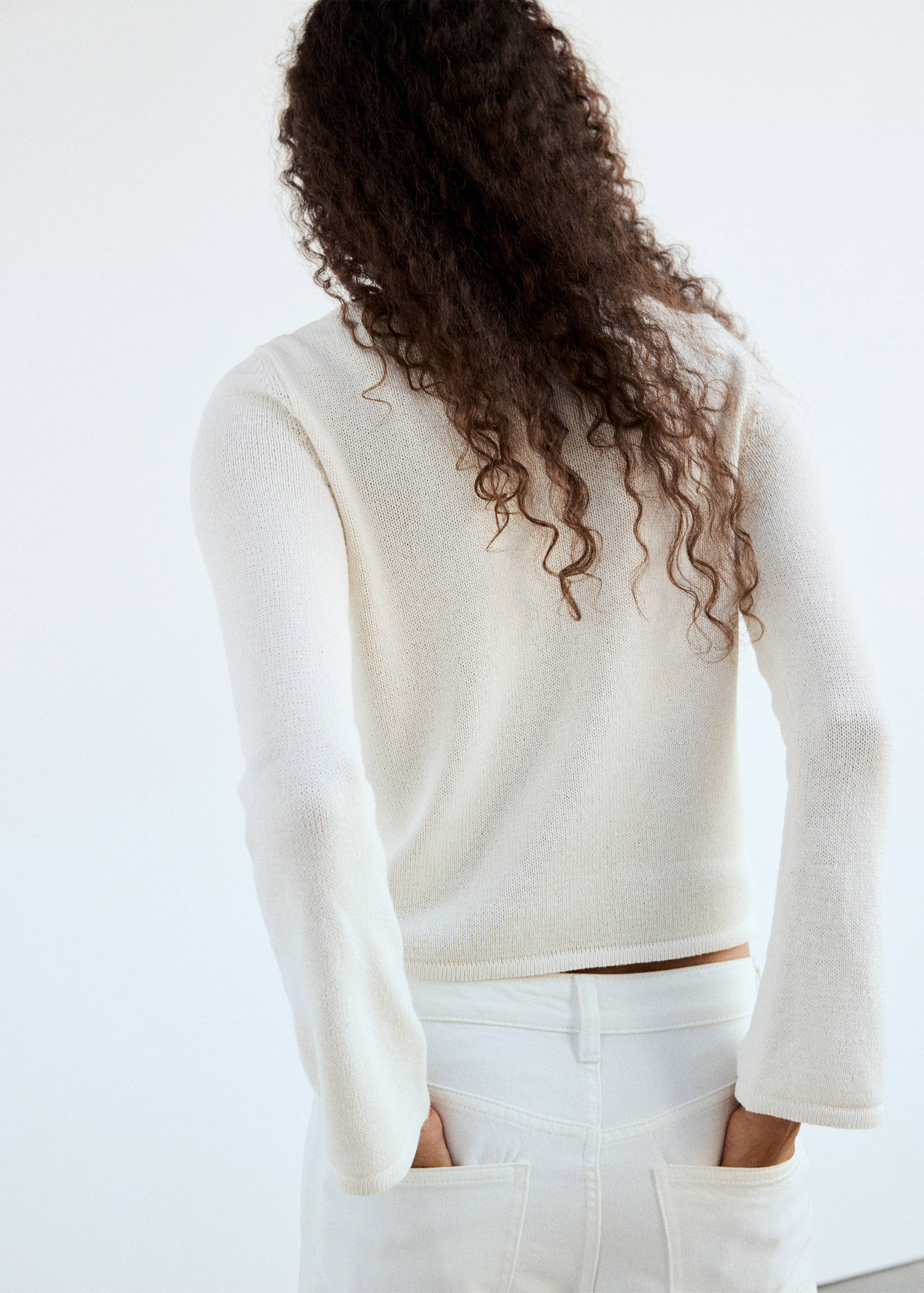 Boat-neck knitted sweater - Reverse of the article