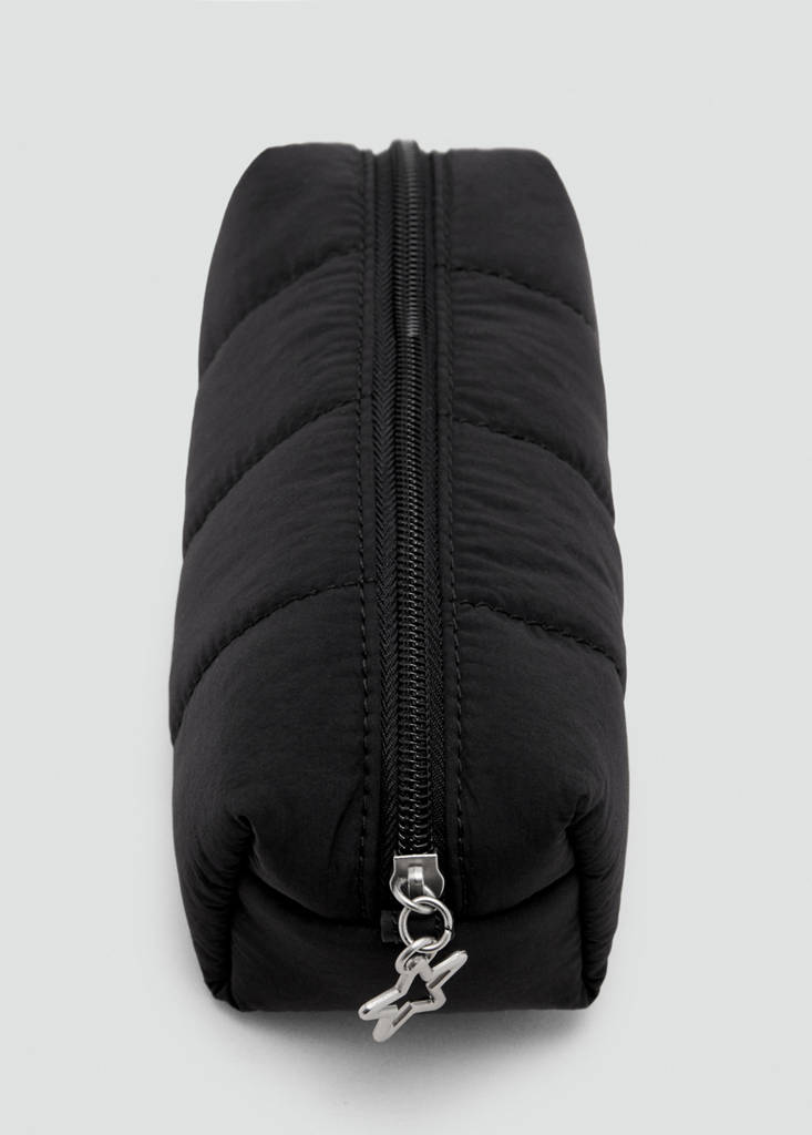 Quilted pouch with star detail — Black
