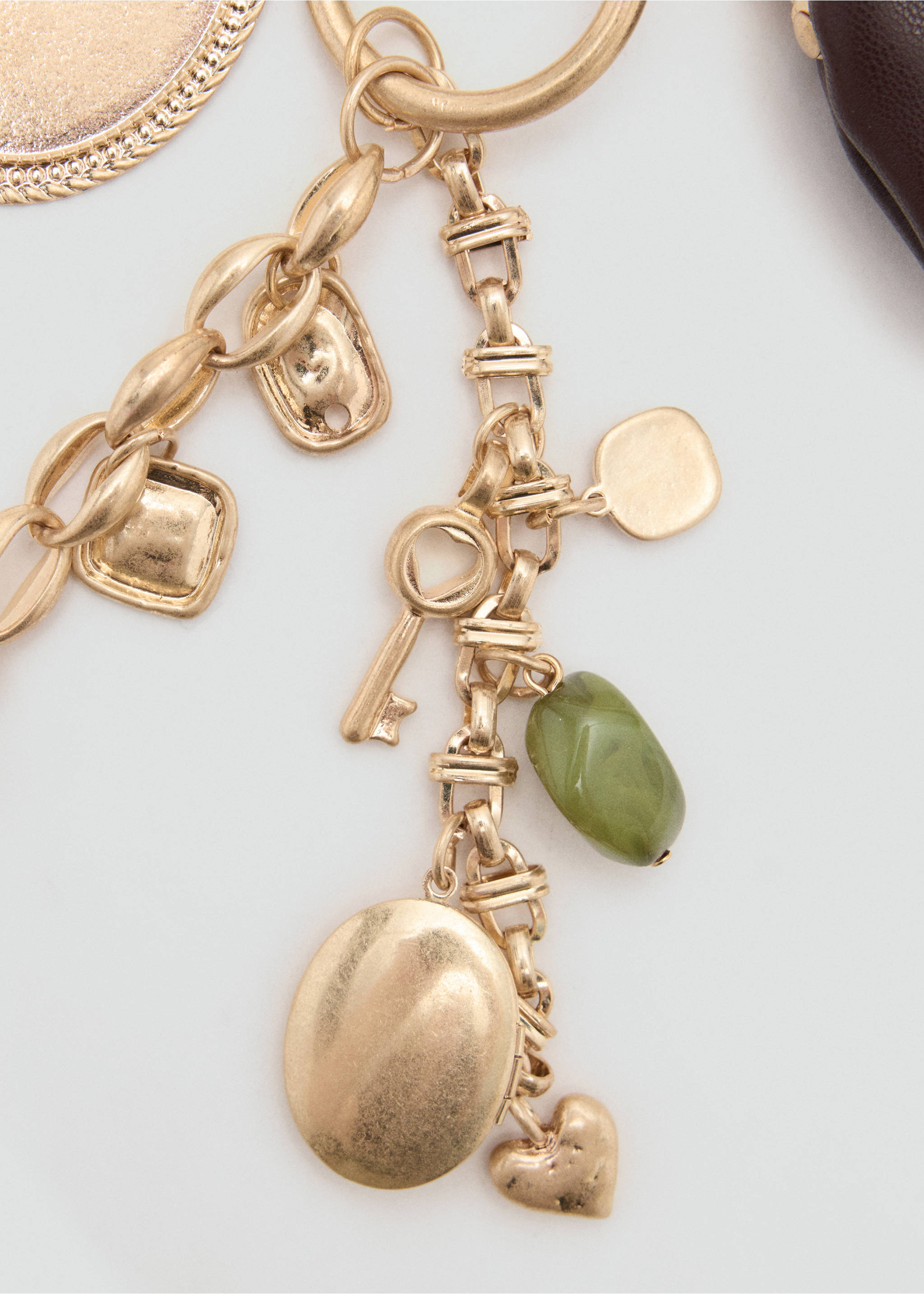 Charm pendant keyring - Medium plane, Gold. Ref: 37034464-00.