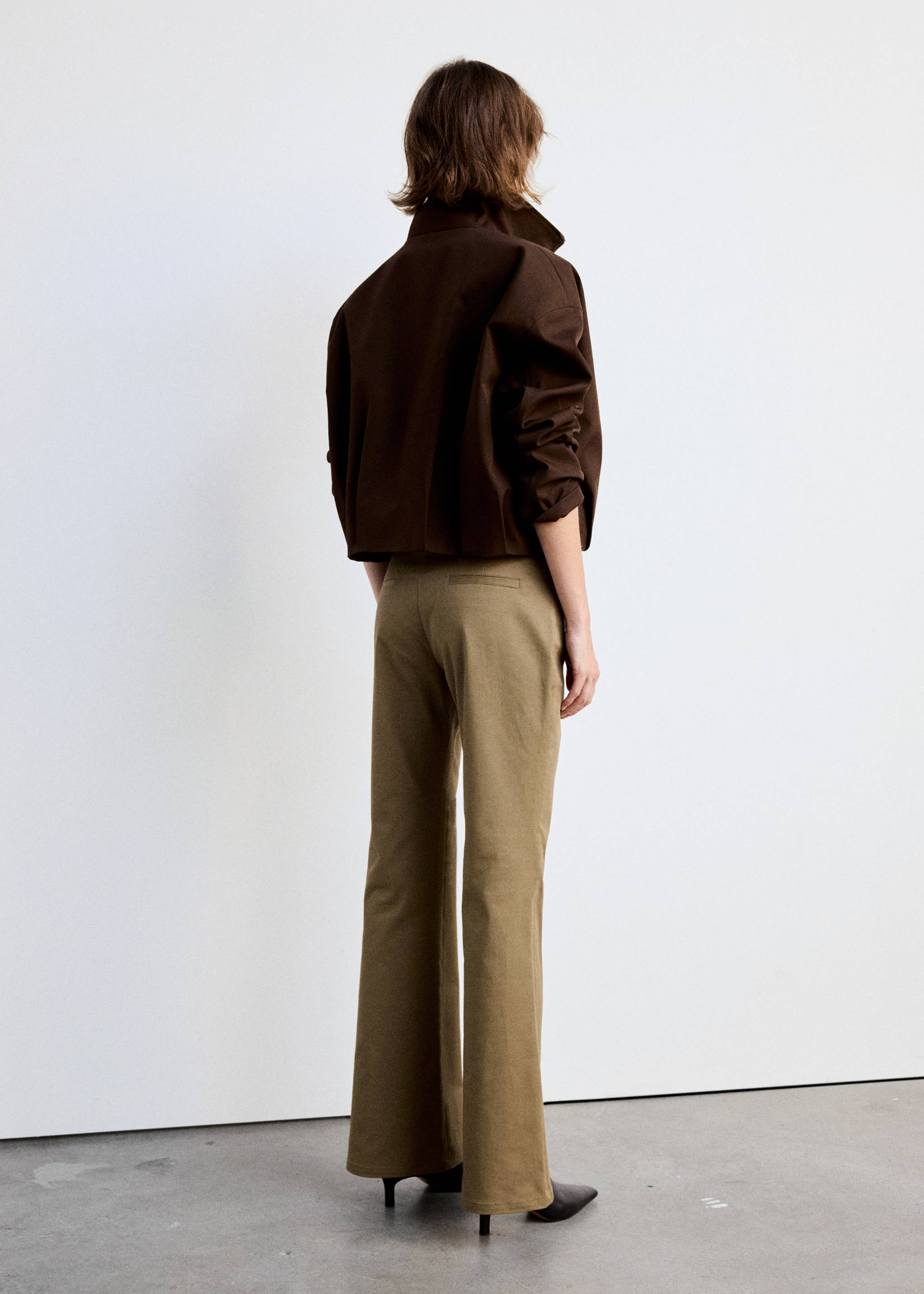 High-waisted flared trousers - Reverse of the article