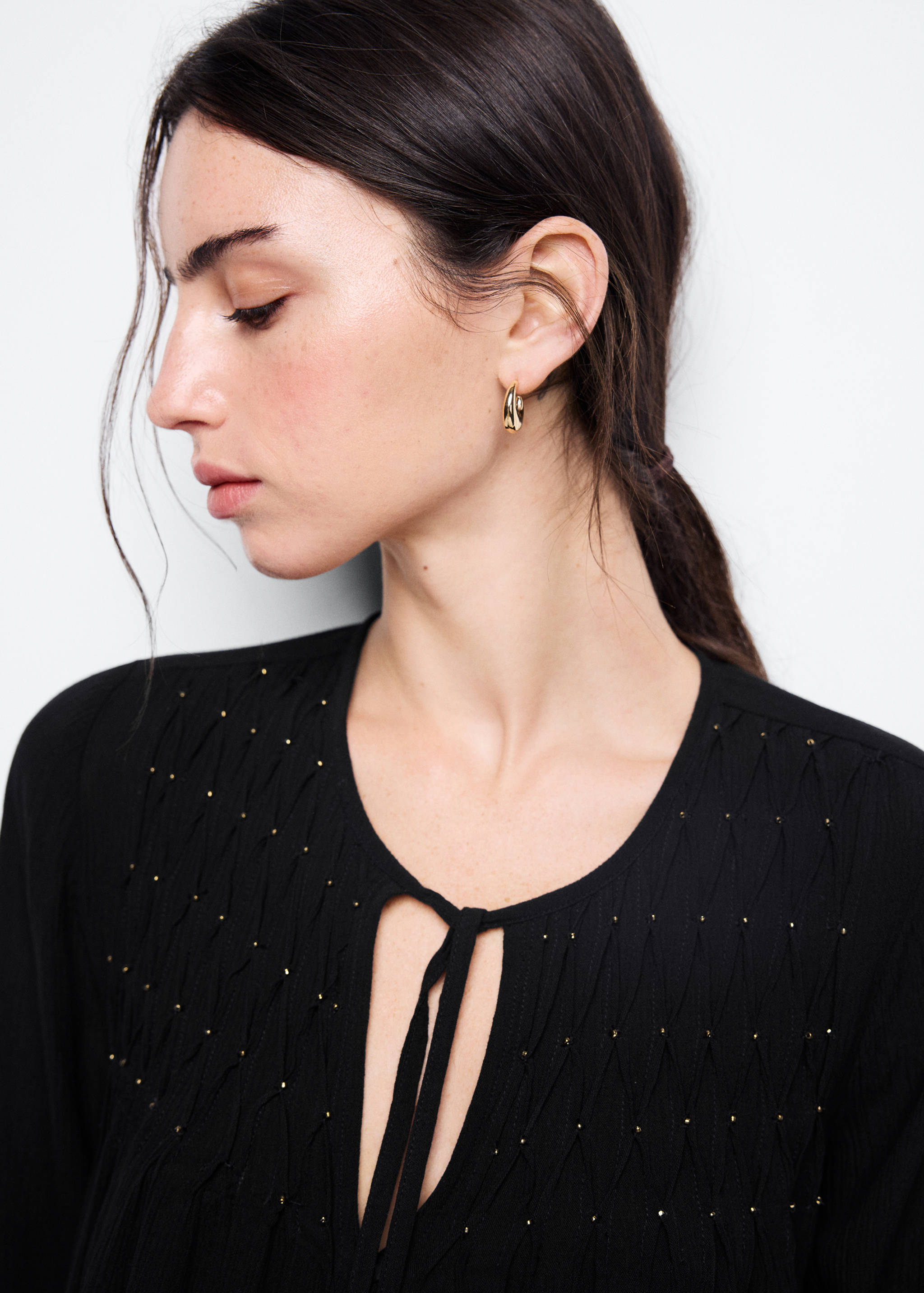 Fluid blouse with metallic details - Details of the article 1