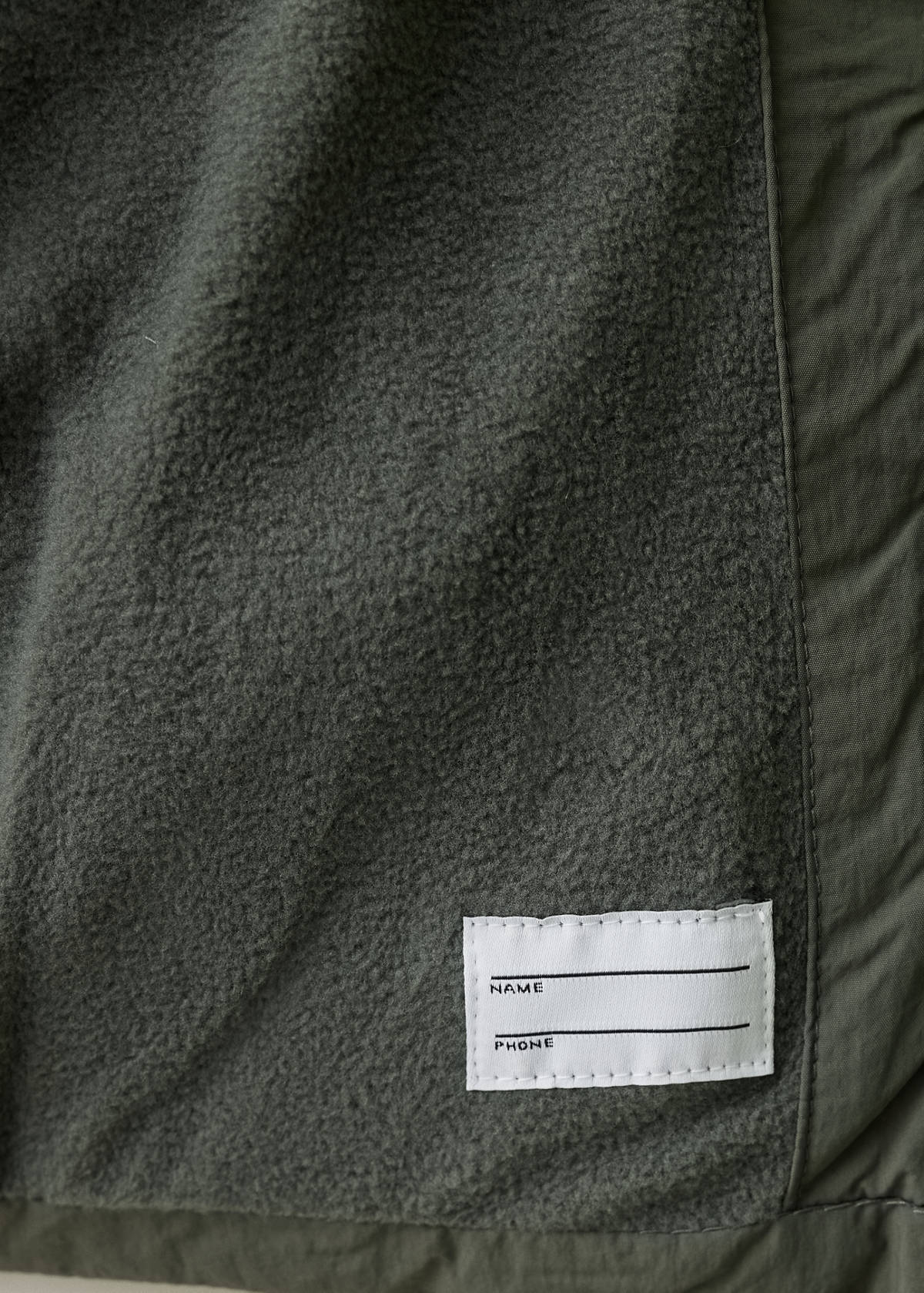 Puffer coat with fur-effect hood — Green