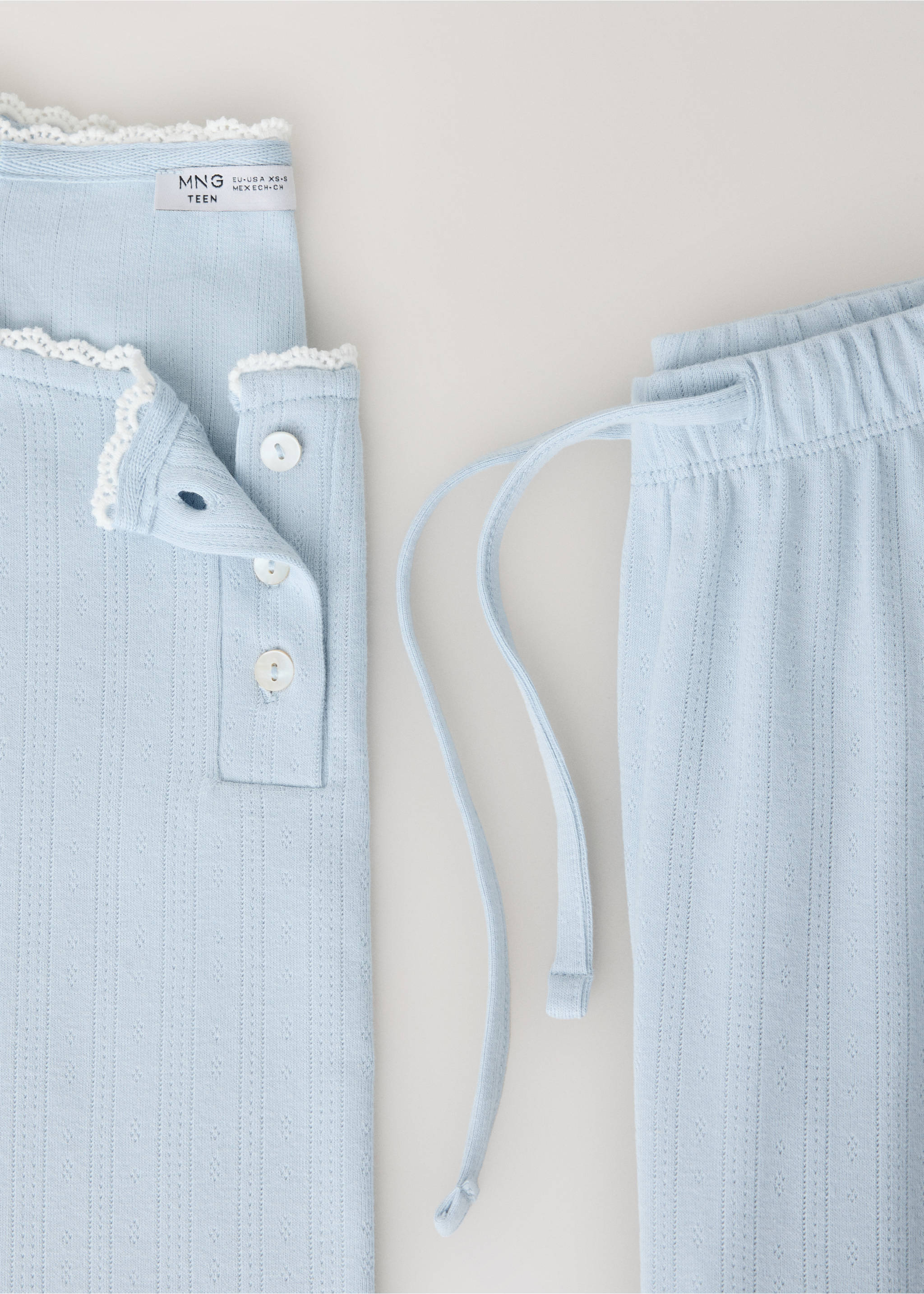 Complete cotton pyjamas with piping - Details of the article 8, Aqua Green. Ref: 37035167-00.