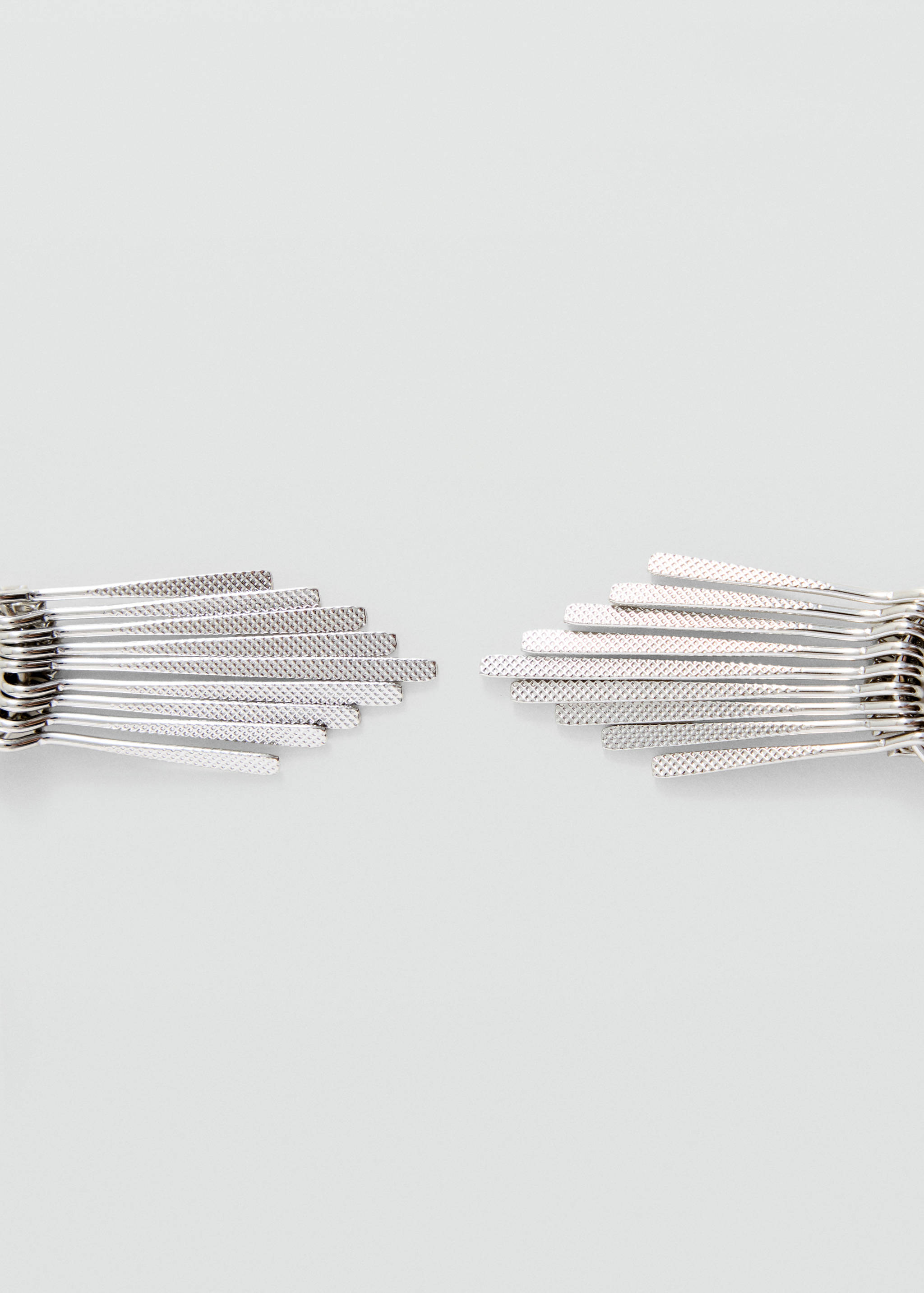 Silver-toned metallic earrings featuring fan-like clusters of textured thin rods.