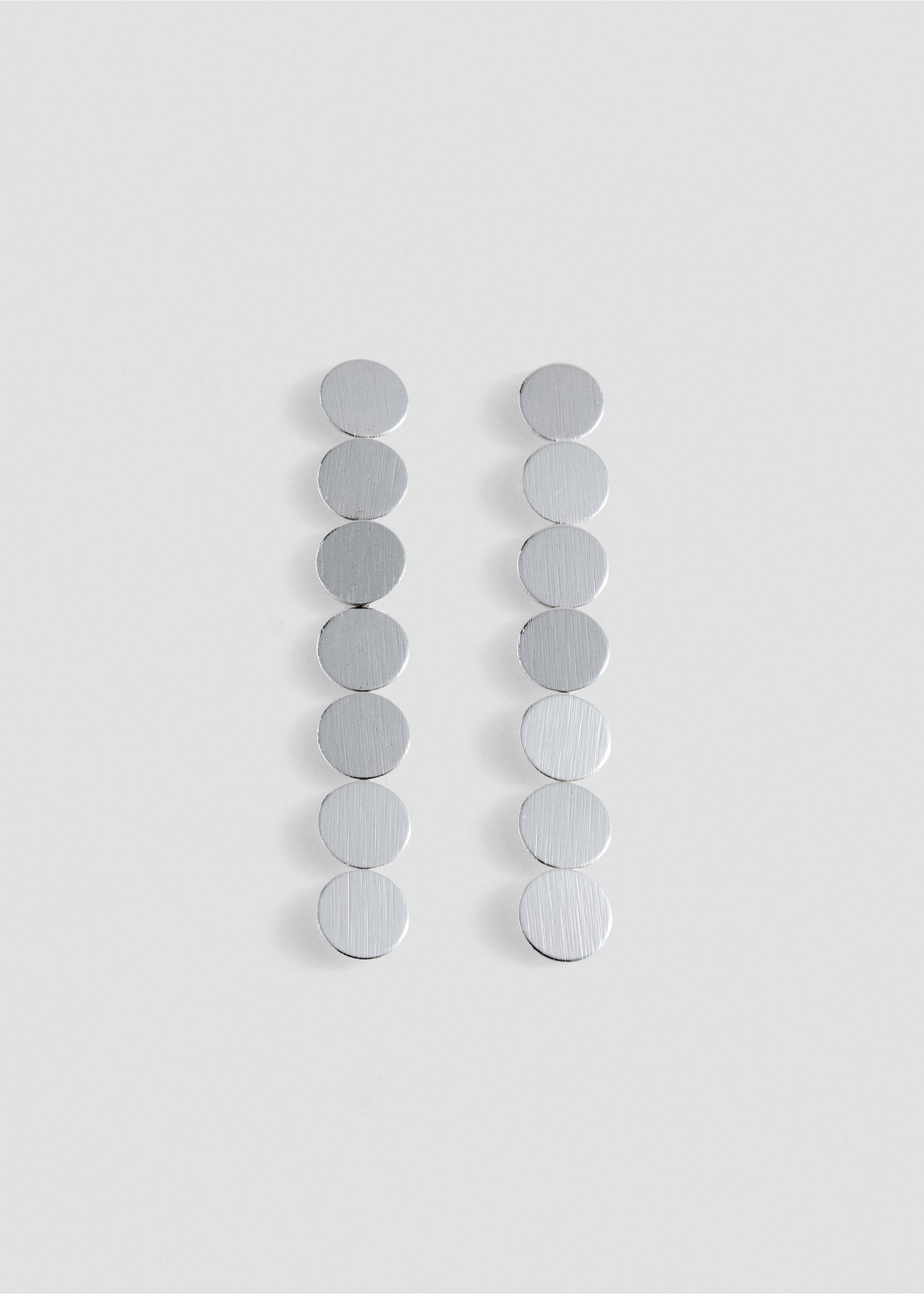 Silver-toned drop earrings with a vertical row of brushed circular discs., Silver. Ref: 37035182-00.