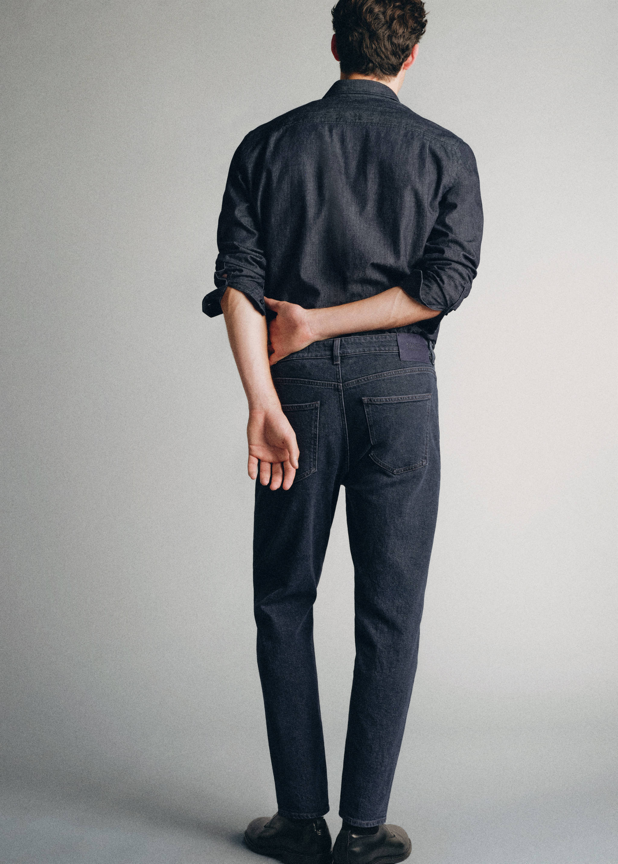 Premium cotton tapered-fit jeans - Reverse of the article