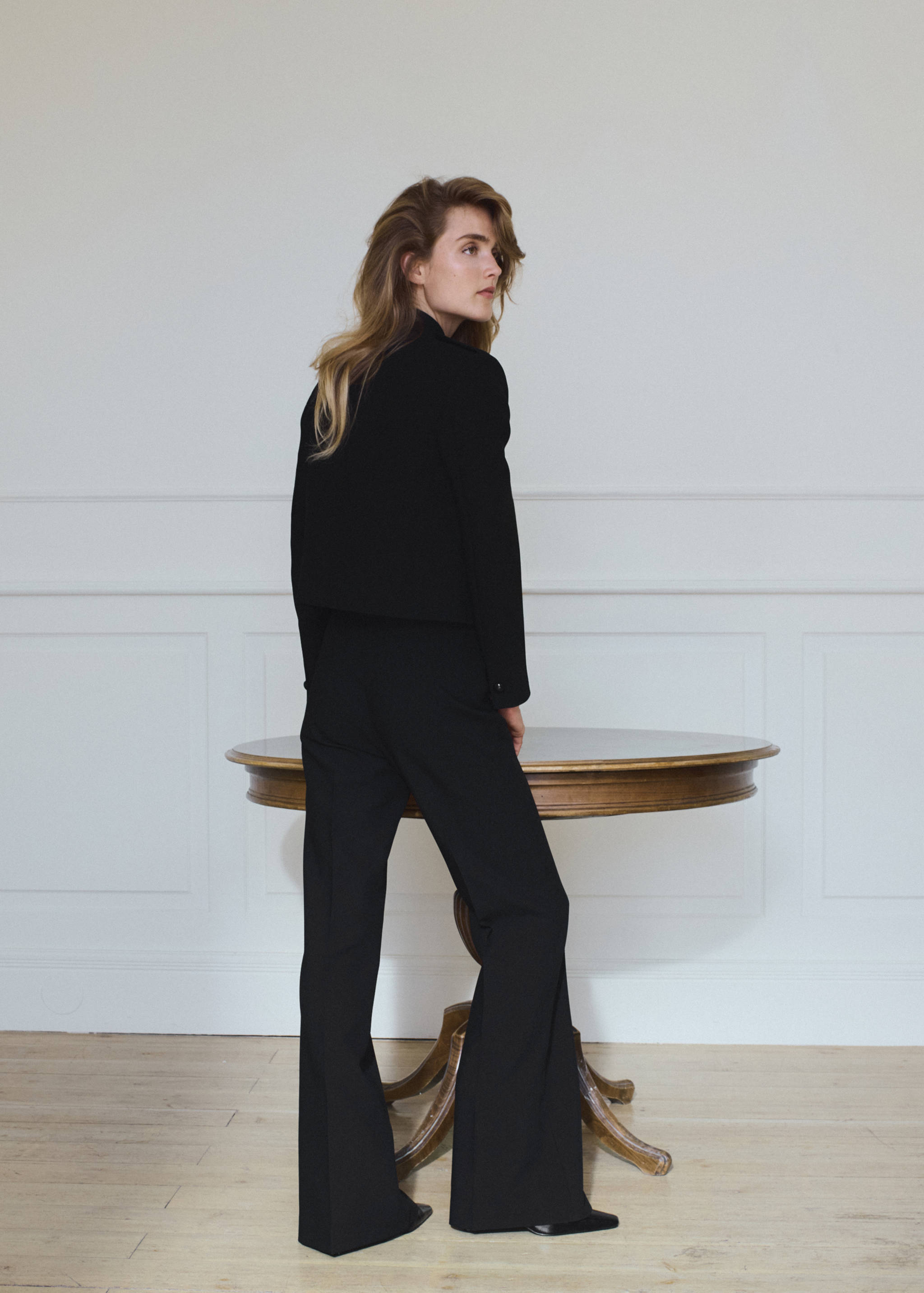 Black jacket, back view.