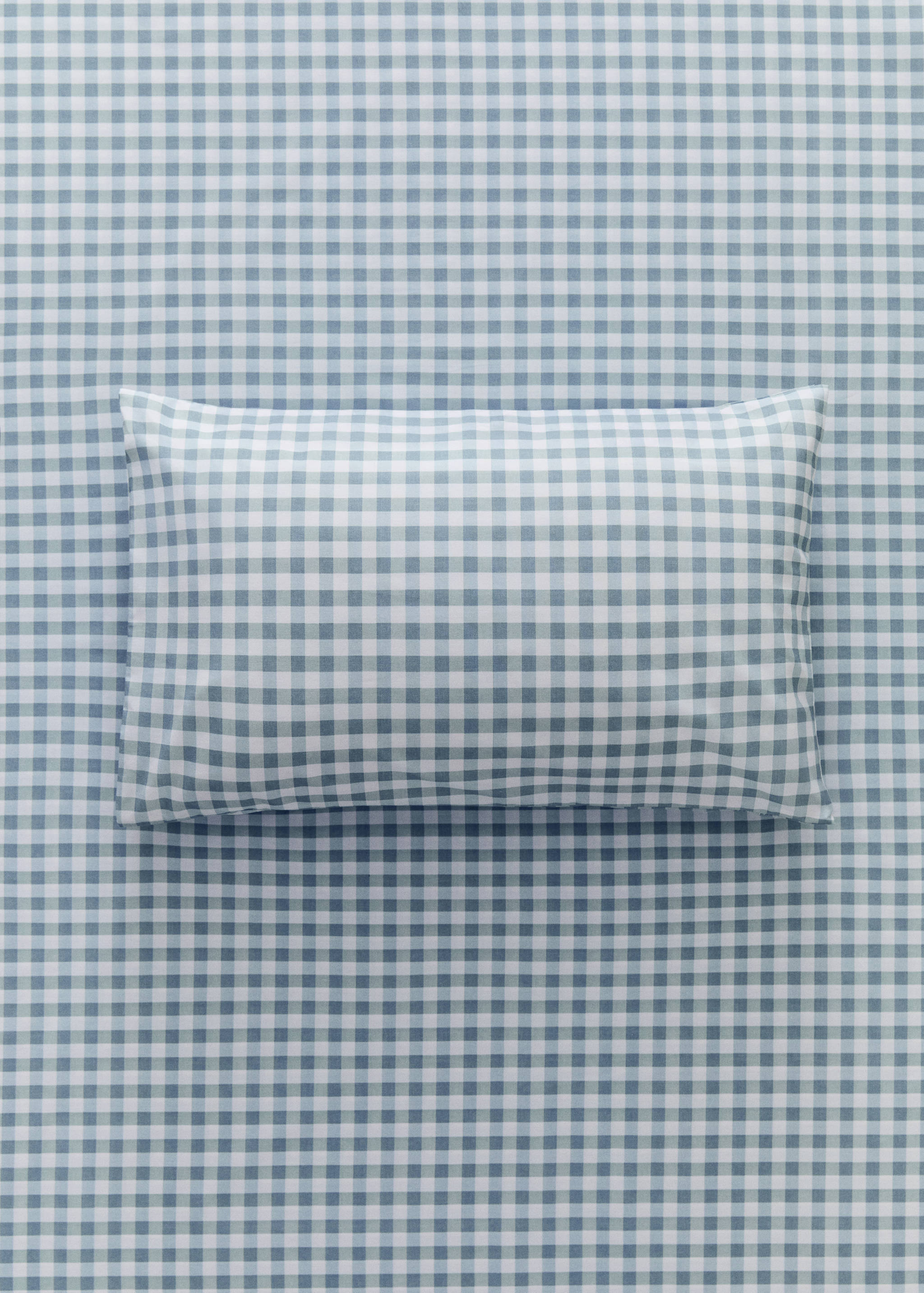 Blue and white gingham check pillowcase.