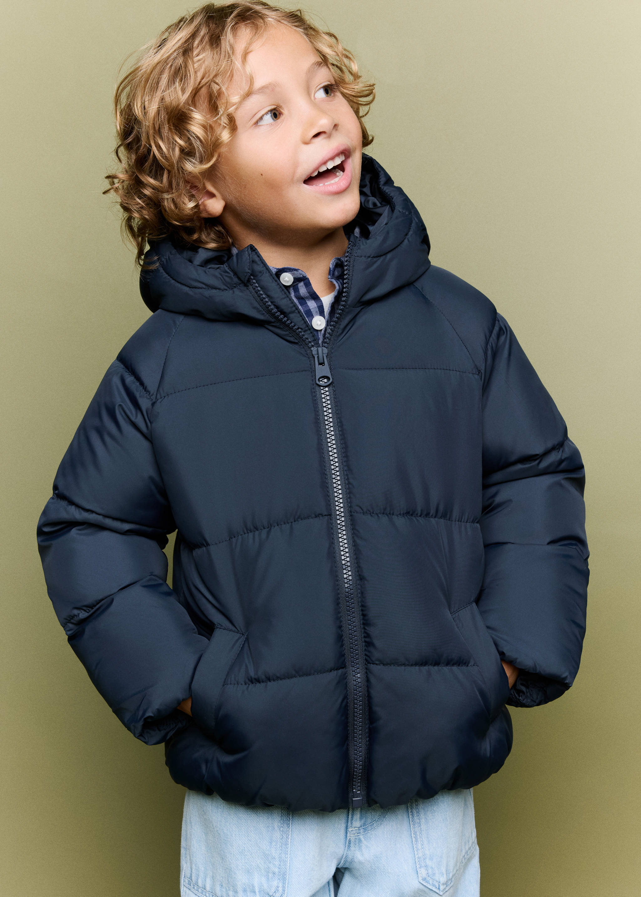 Navy blue quilted anorak with hood and zip fastening