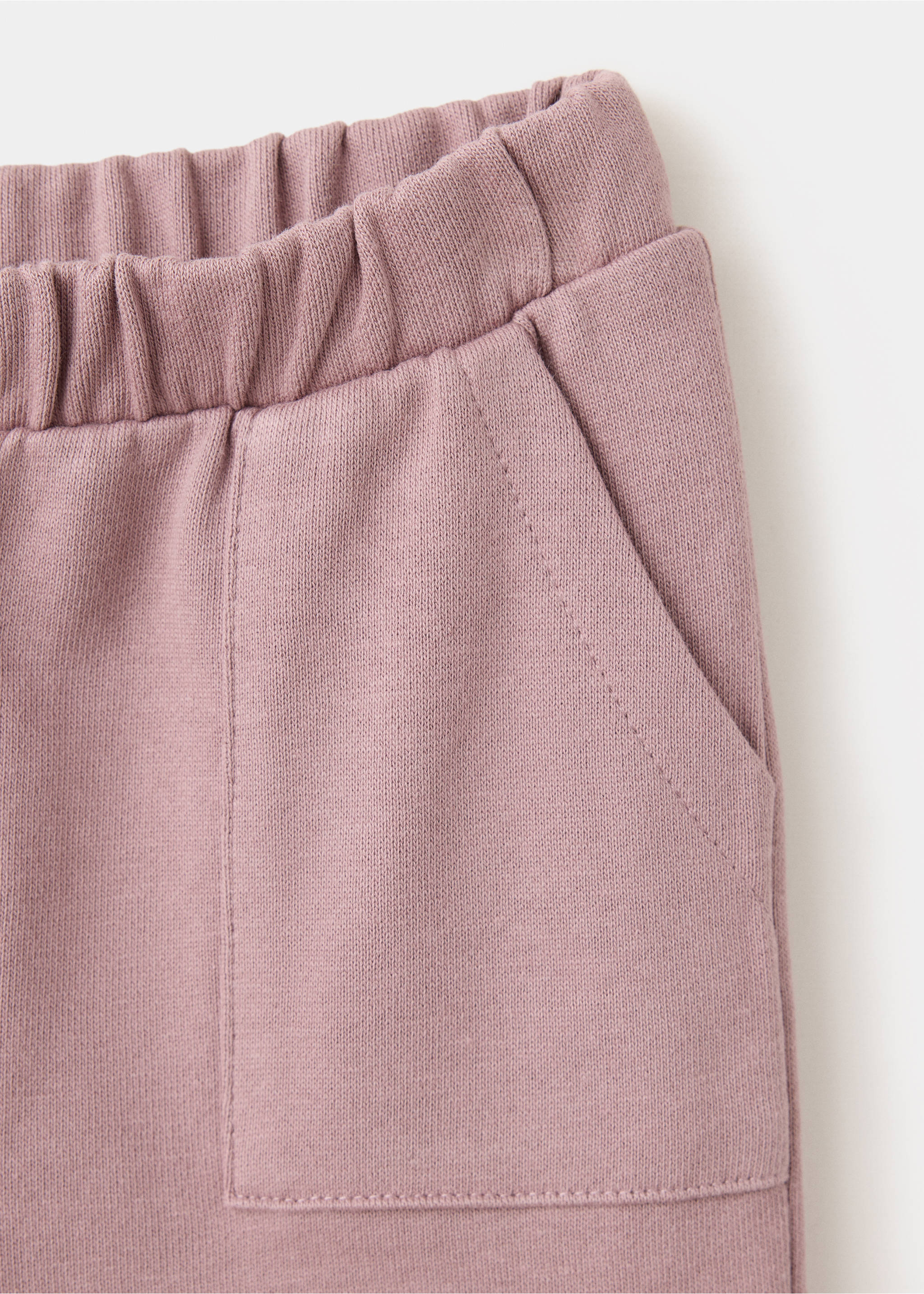Cuffed jogger trousers - Details of the article 8, Burgundy. Ref: 37035988-00.