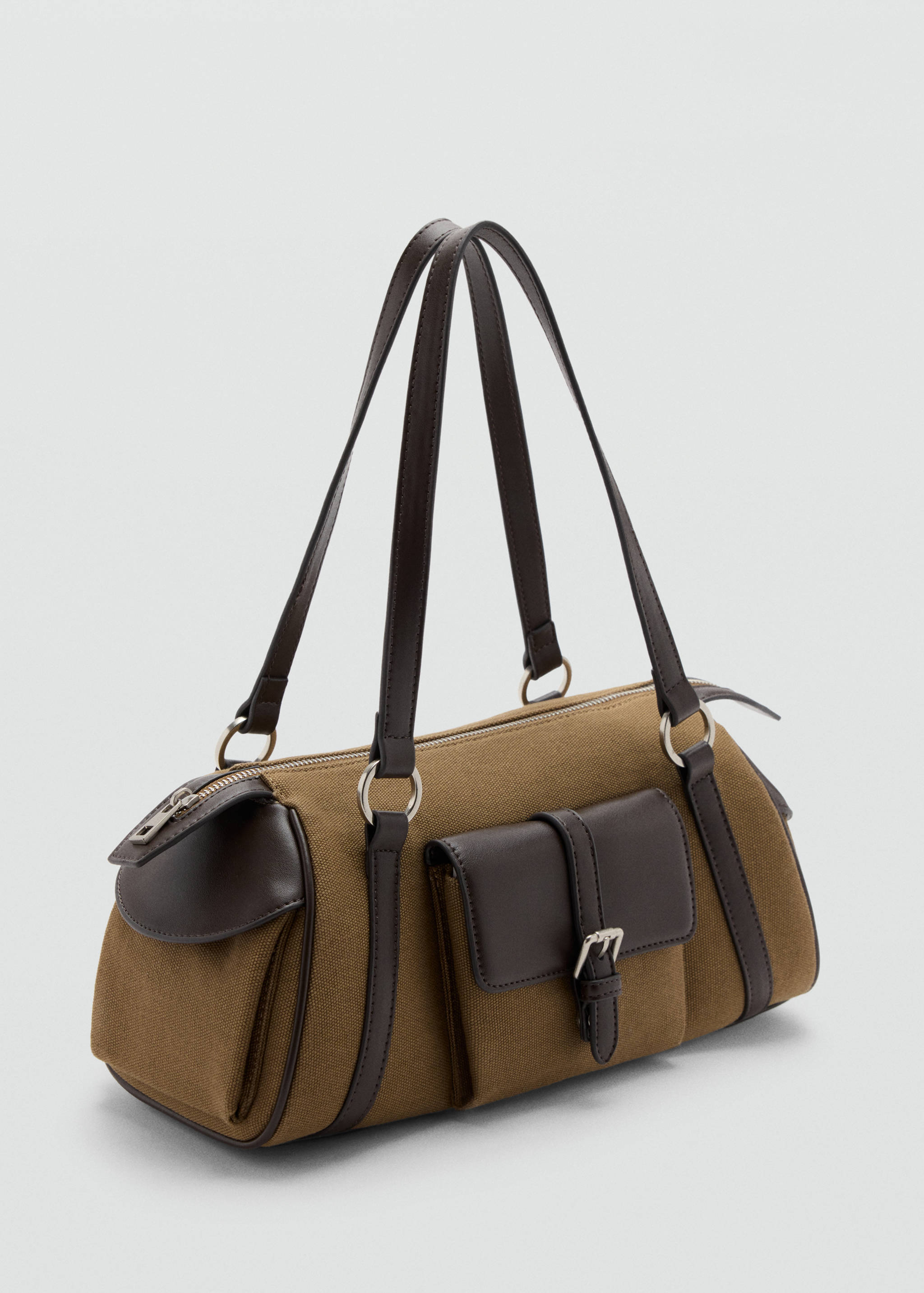 Khaki canvas shoulder bag with dark brown trim and front buckled pocket.
