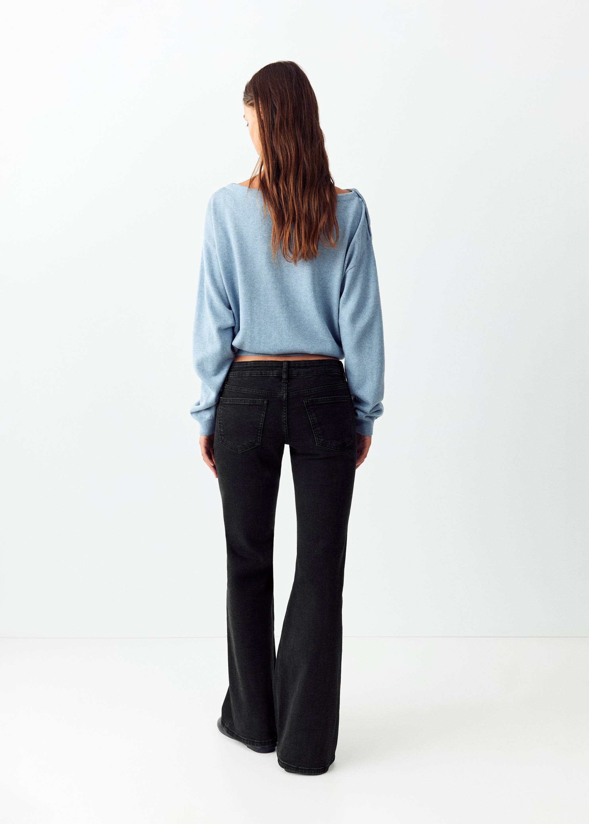 Jeans flare tachuelas - Reverso del artículo