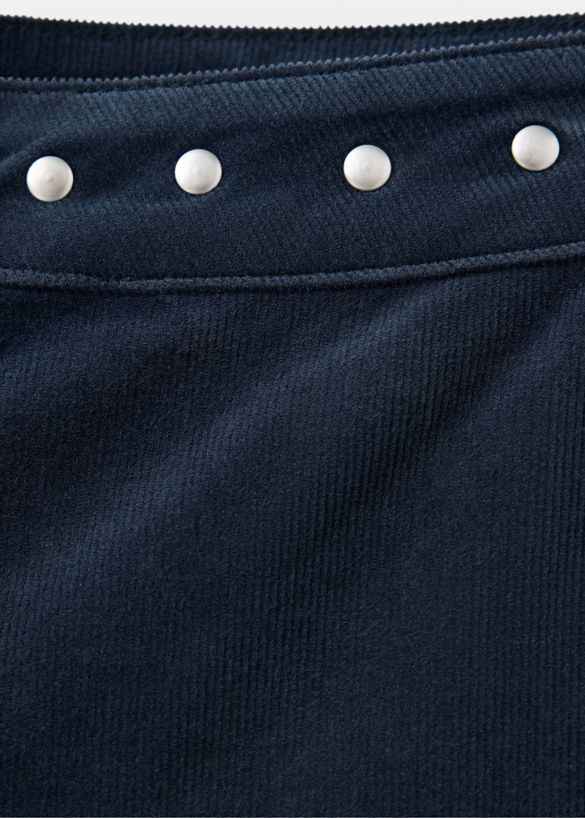 Close-up of navy blue corduroy fabric with silver studs., Navy. Ref: 37036726-00.