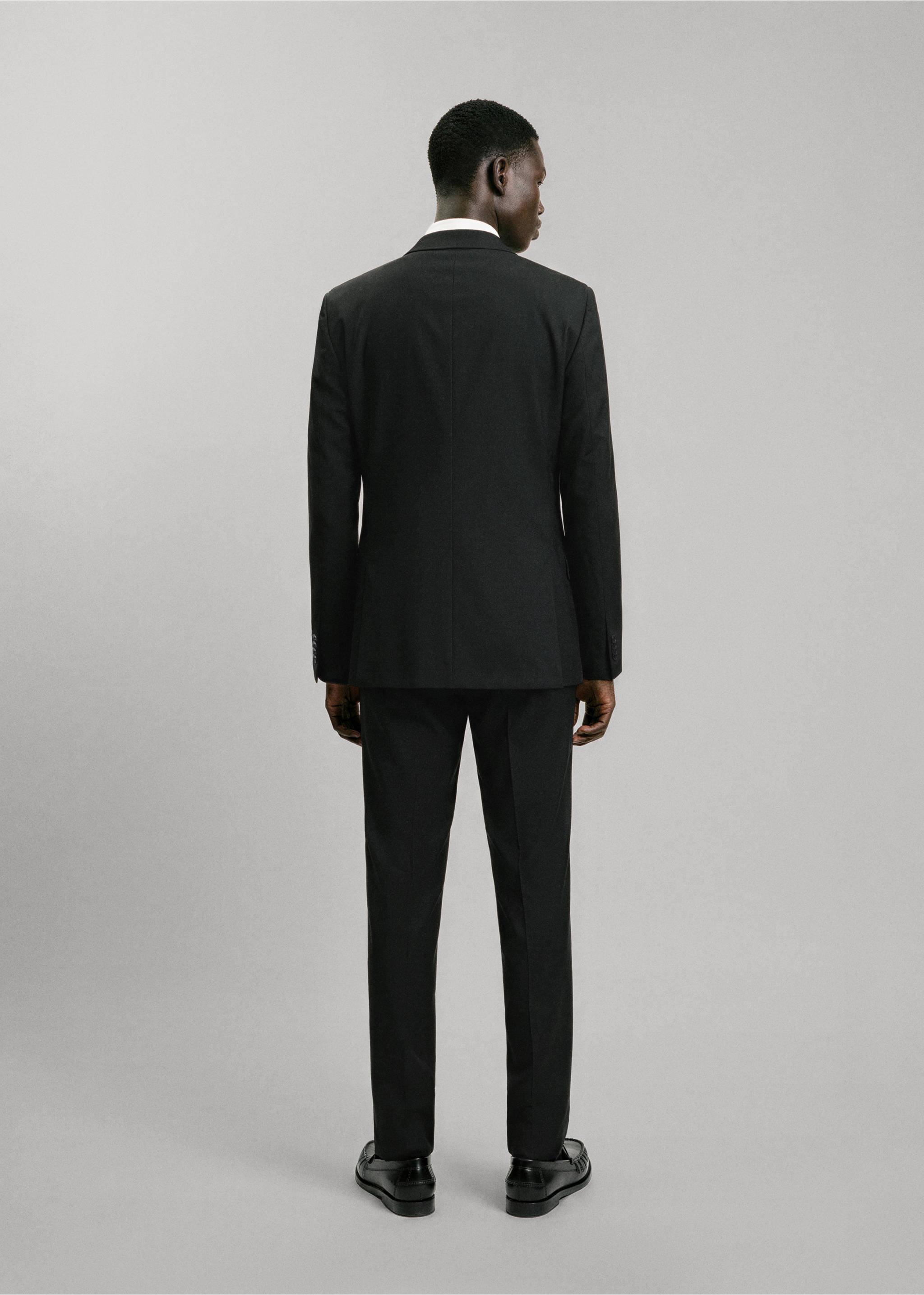 Straight jacket with flap pockets - Reverse of the article, Black. Ref: 37036737-00.