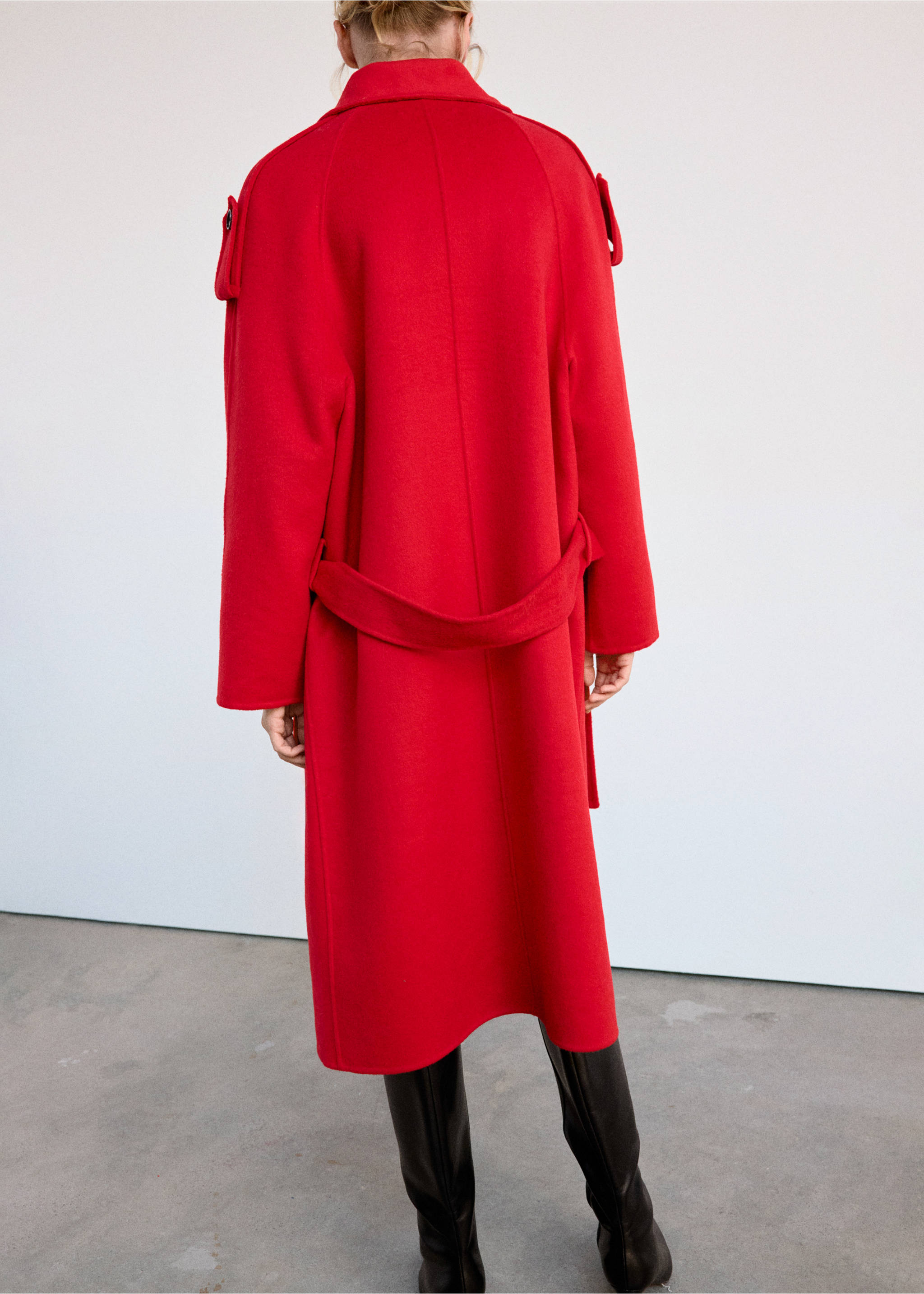 Red coat with a belt and shoulder epaulettes, shown from the back., Red. Ref: 37036740-01.