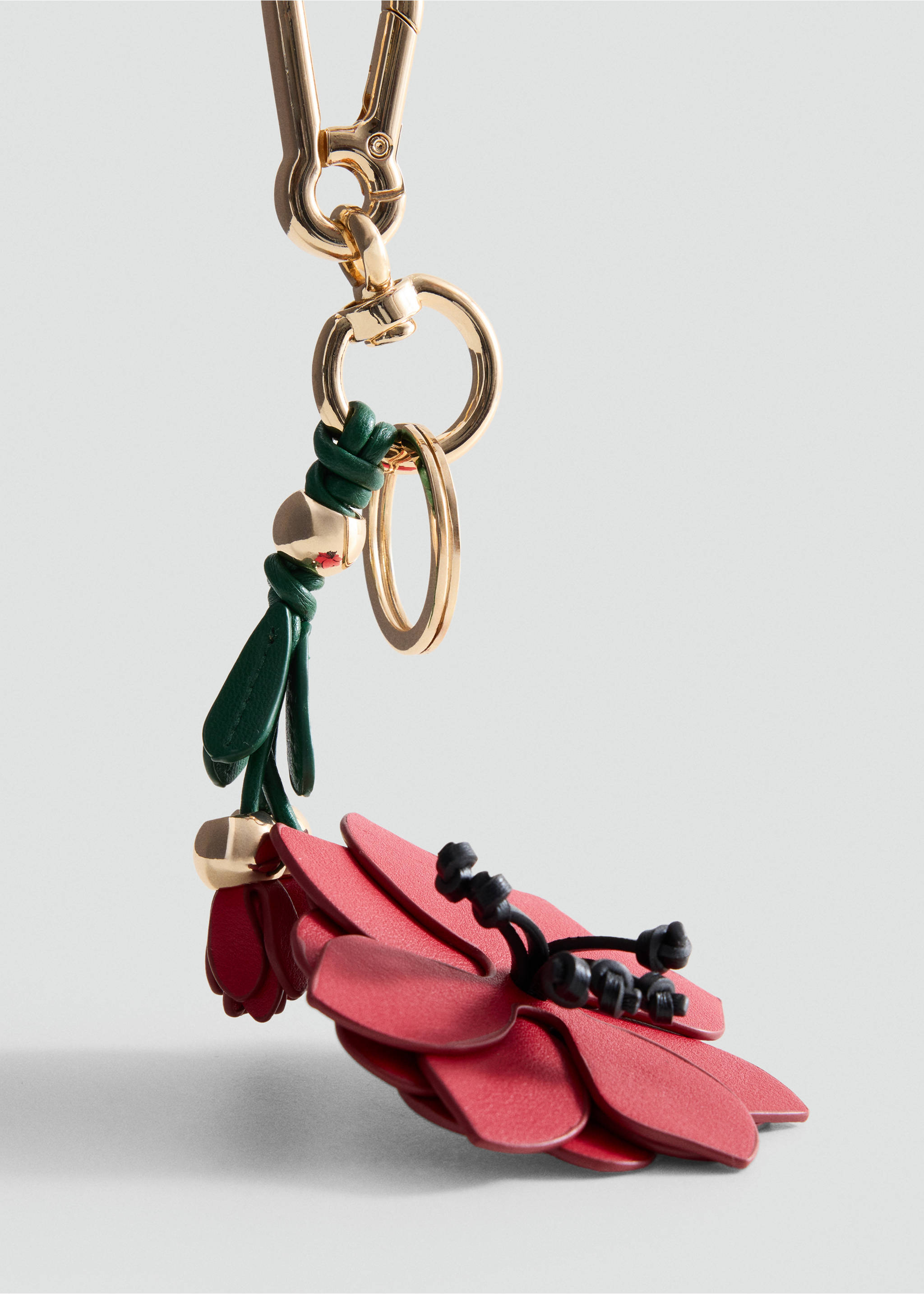 Red floral keychain with gold-tone hardware and green details., Red. Ref: 37036749-00.