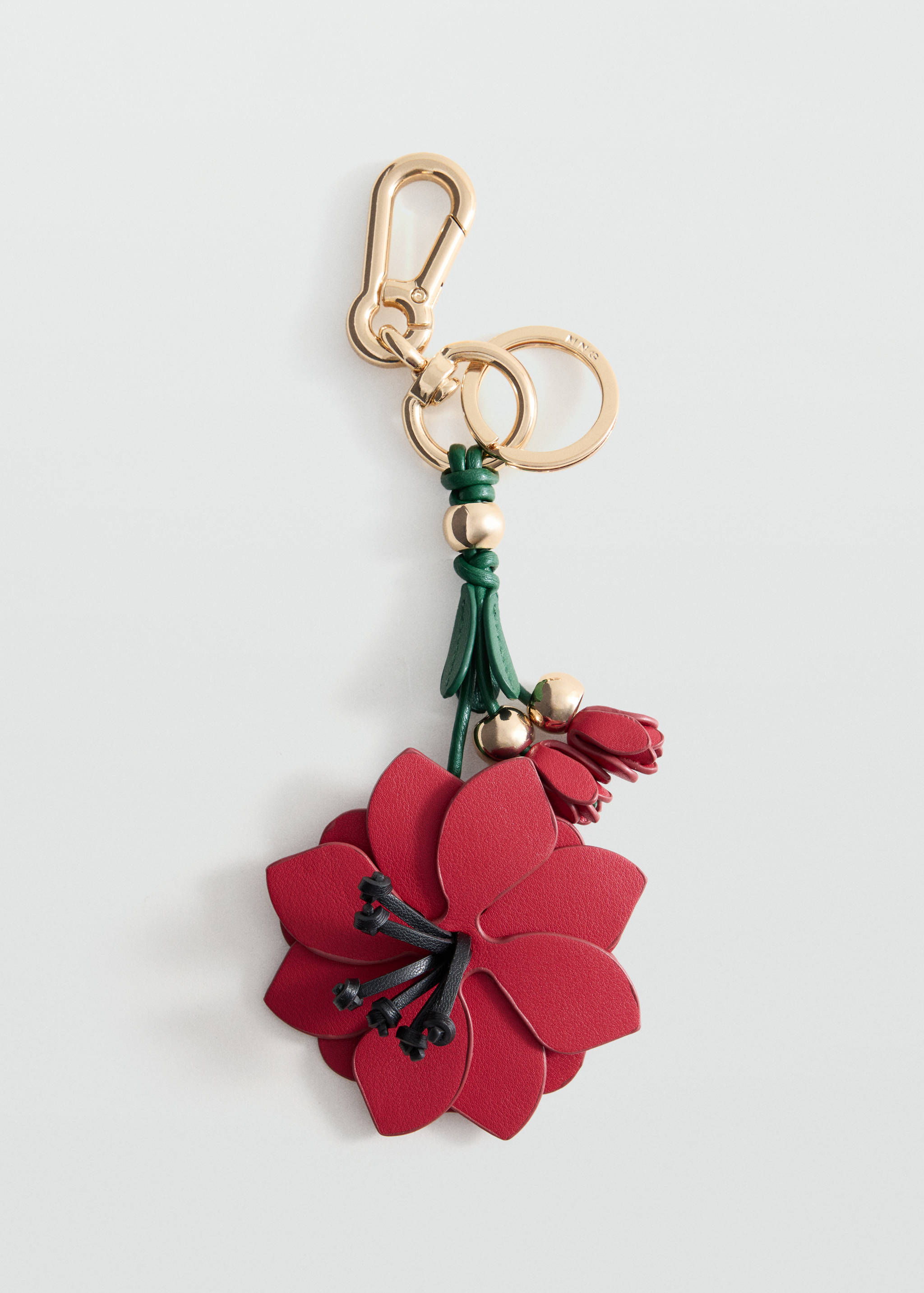 Red and green leather flower key ring with gold hardware.