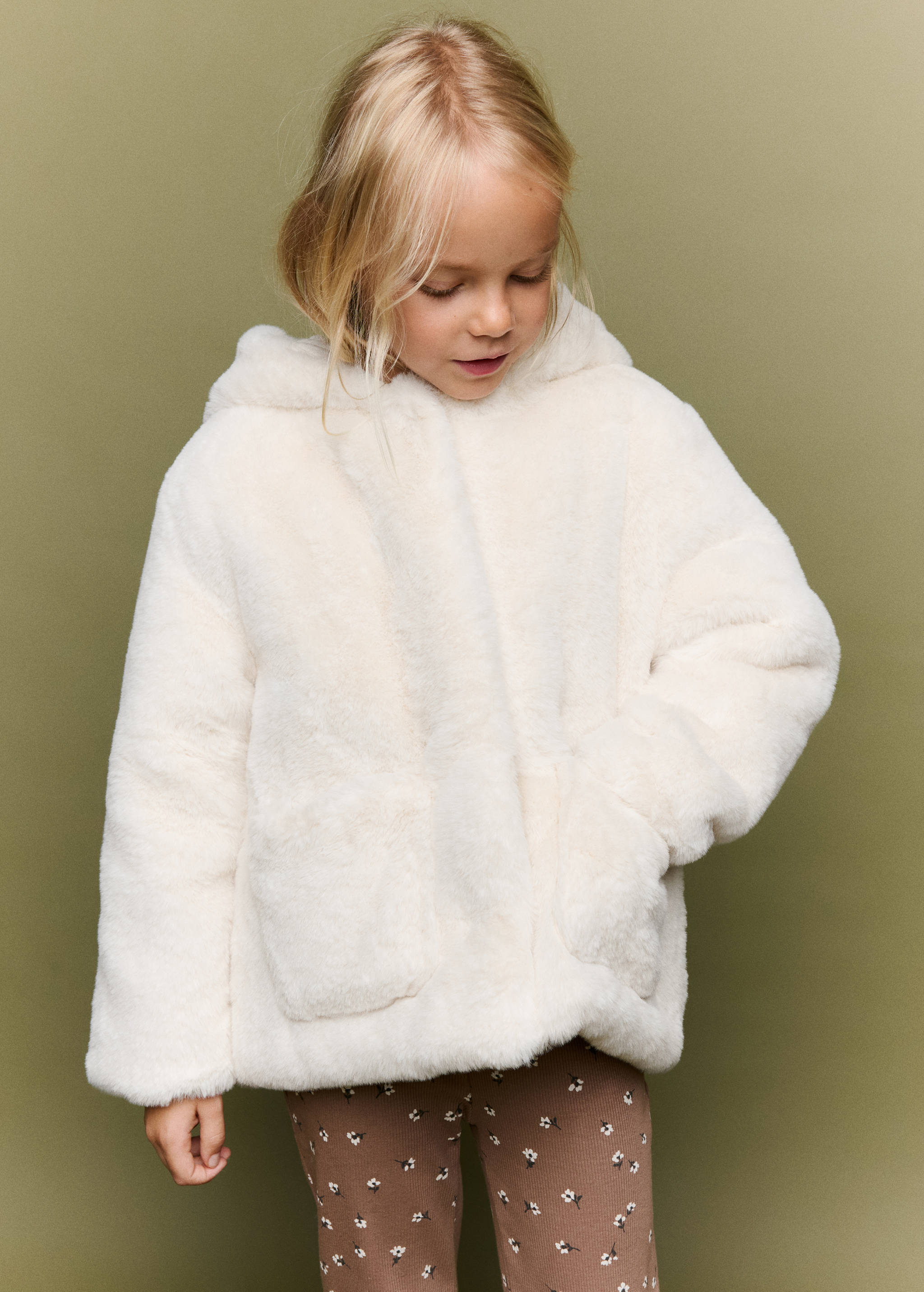 Off-white hooded faux-fur coat with patch pockets.
