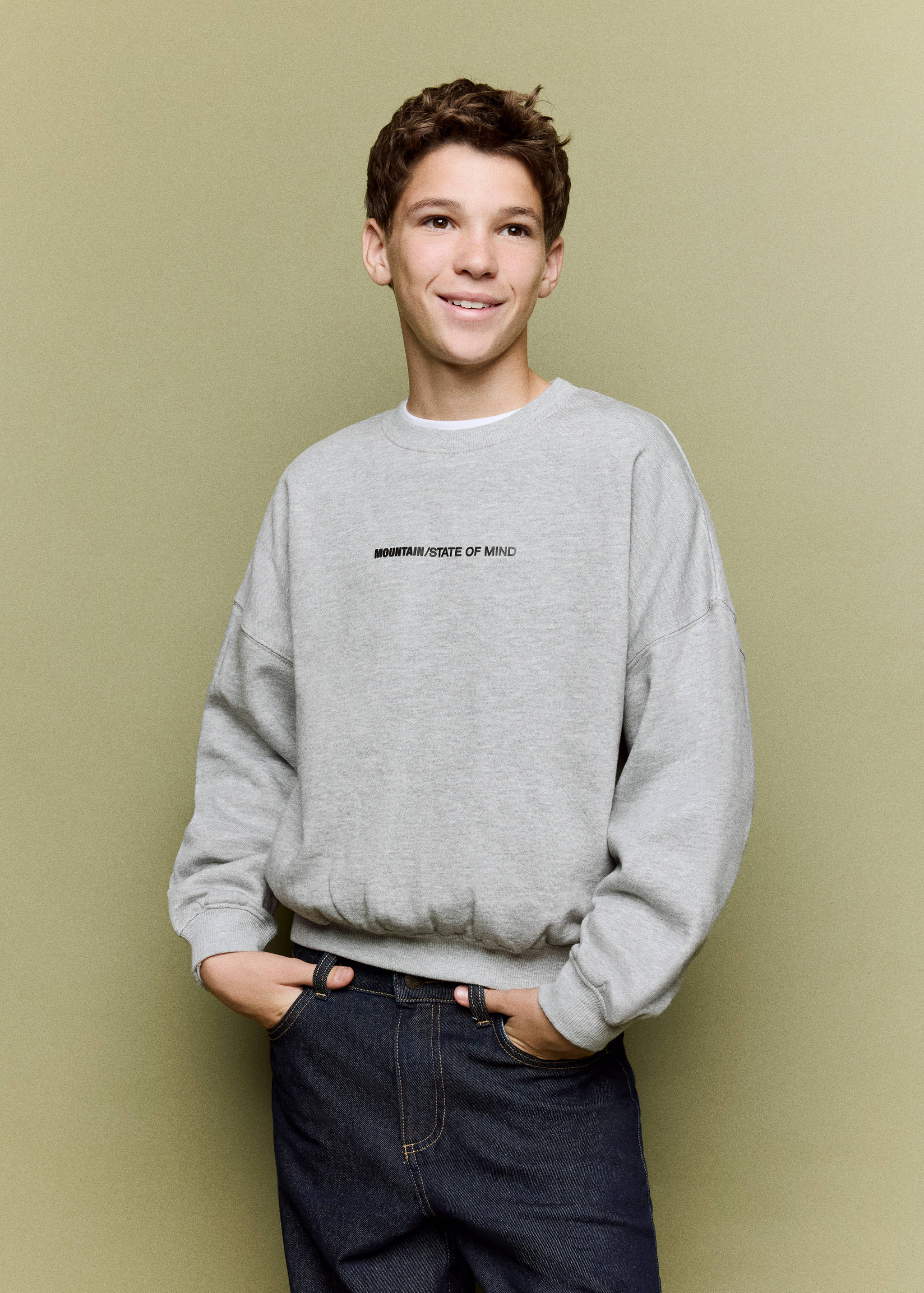 Grey crew-neck sweatshirt with drop shoulders and text print.