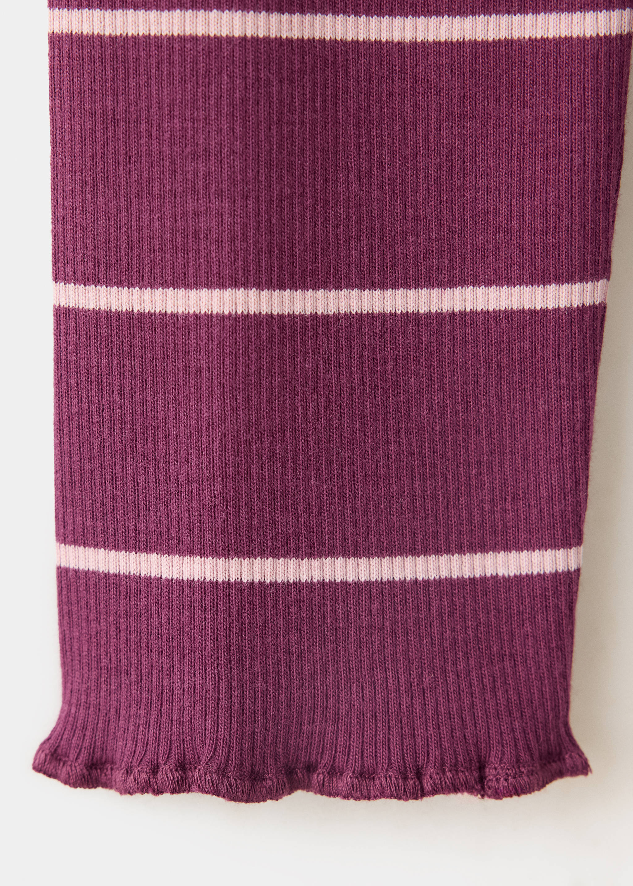 Plum ribbed t-shirt fabric with pink stripes and a lettuce hem.