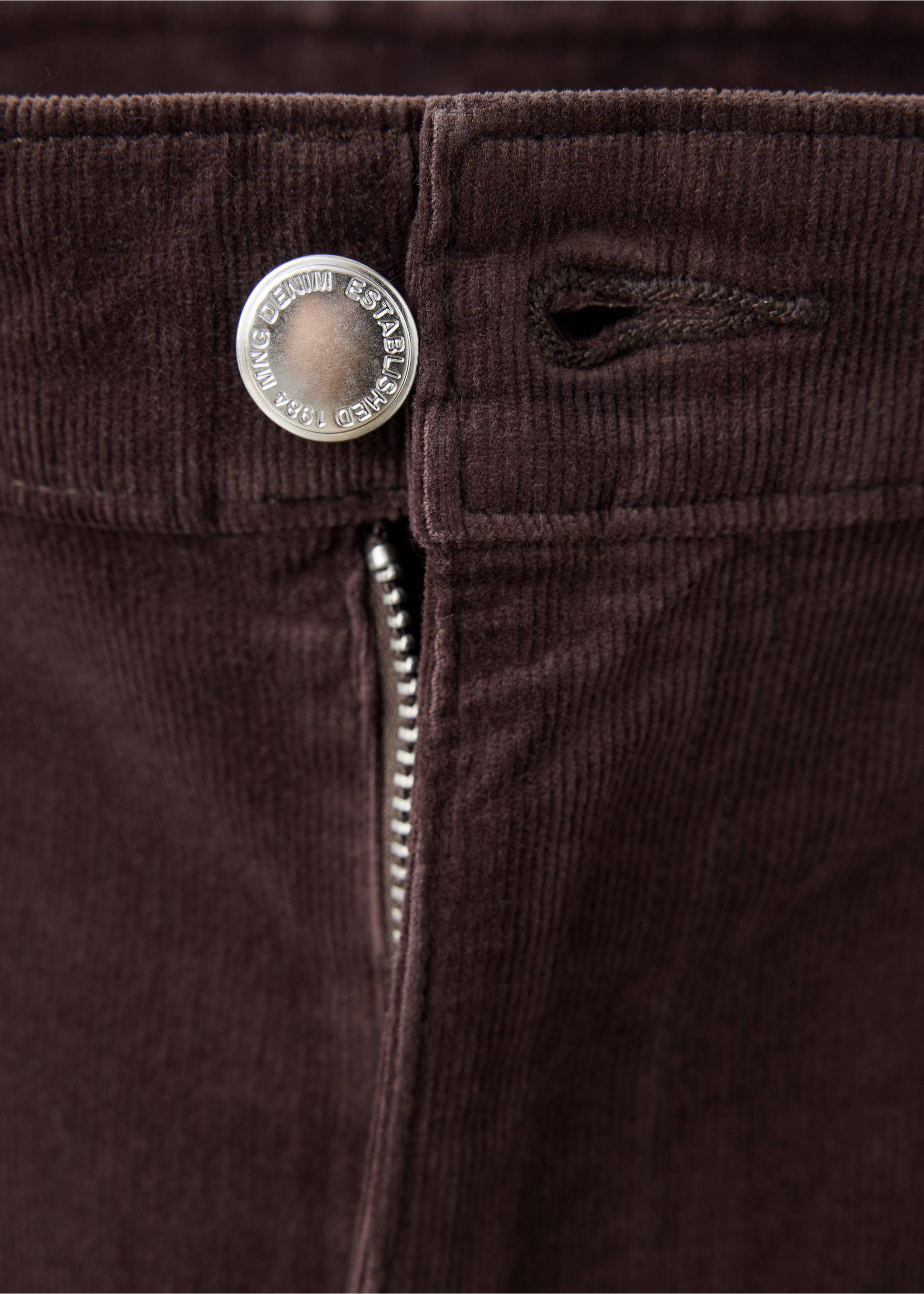 Close-up of brown corduroy trousers waistband and button., Brown. Ref: 37037790-00.