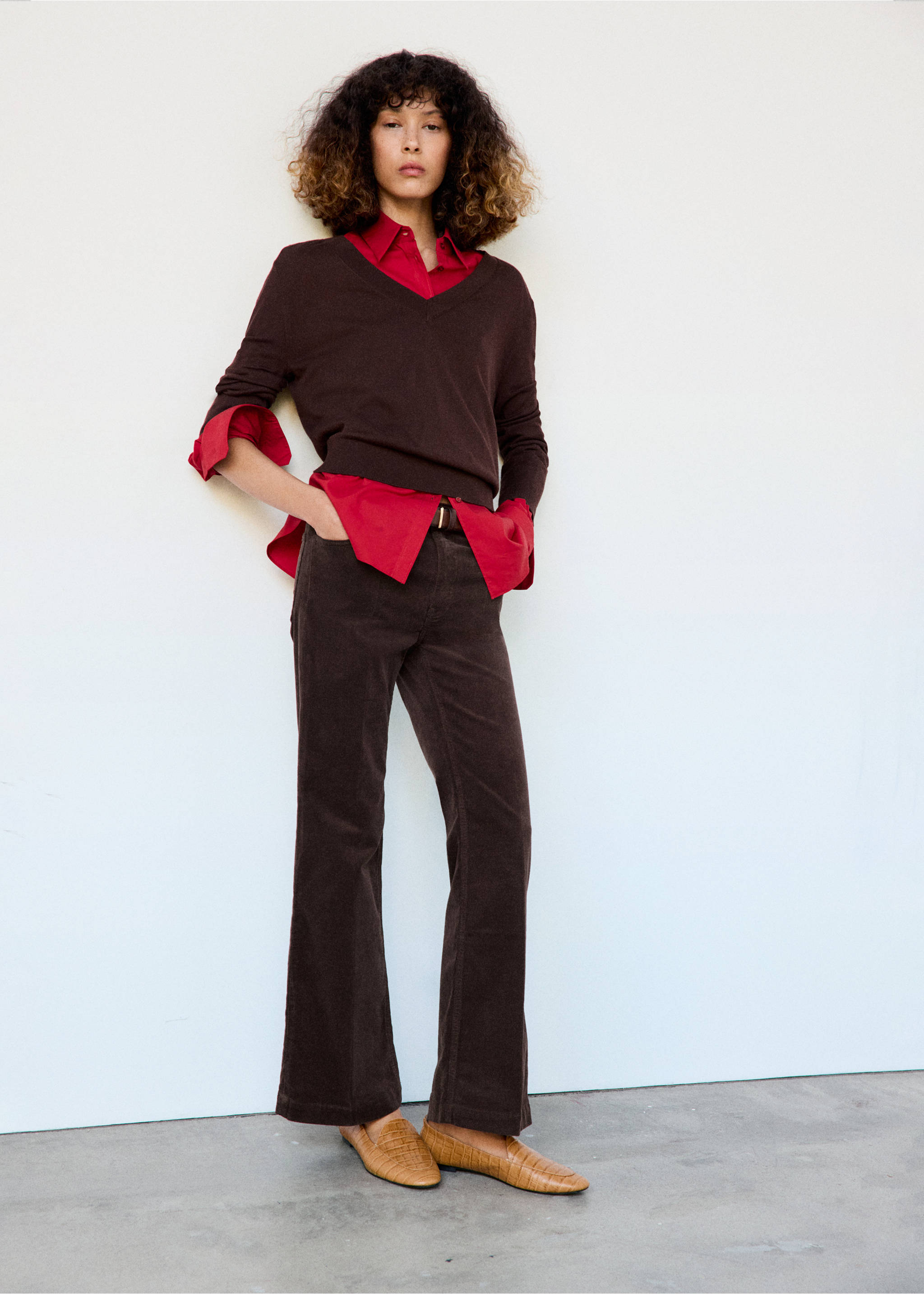 Dark brown corduroy trousers worn with a red shirt and brown V-neck sweater., Brown. Ref: 37037790-01.