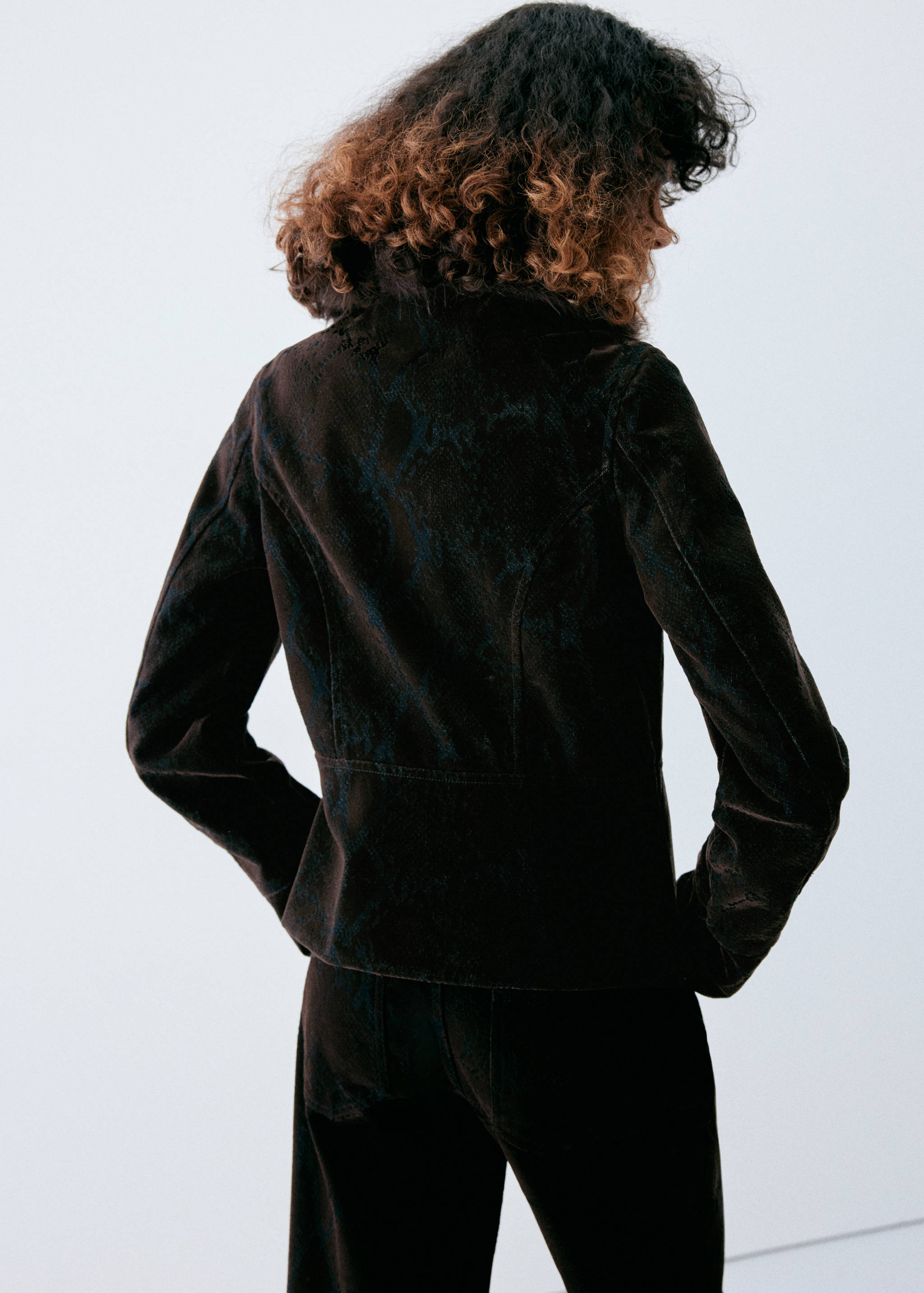Dark brown jacket, shown from the back with a tailored fit.