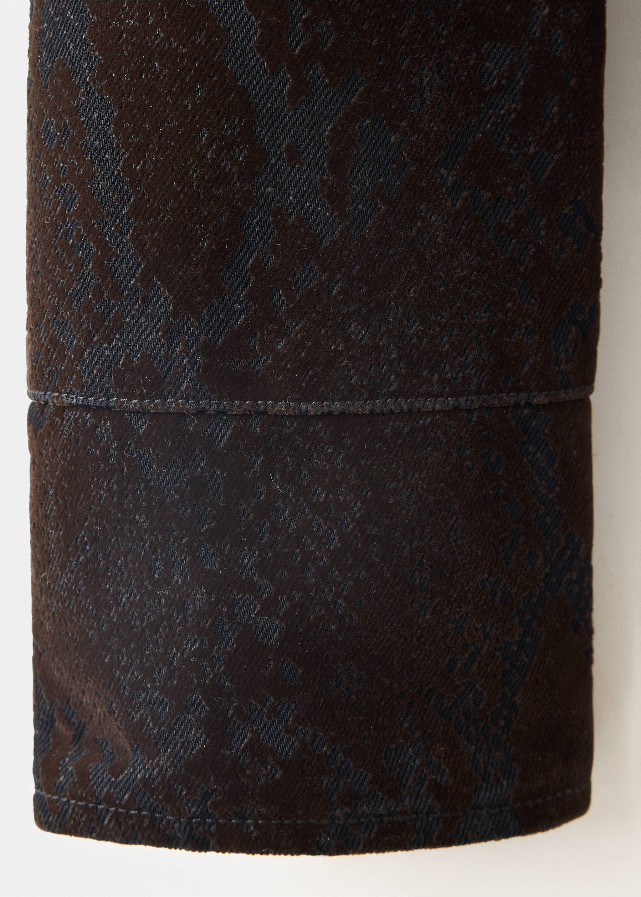 Brown jacket fabric close-up with a dark patterned velvety texture., Chocolate. Ref: 37037793-00.