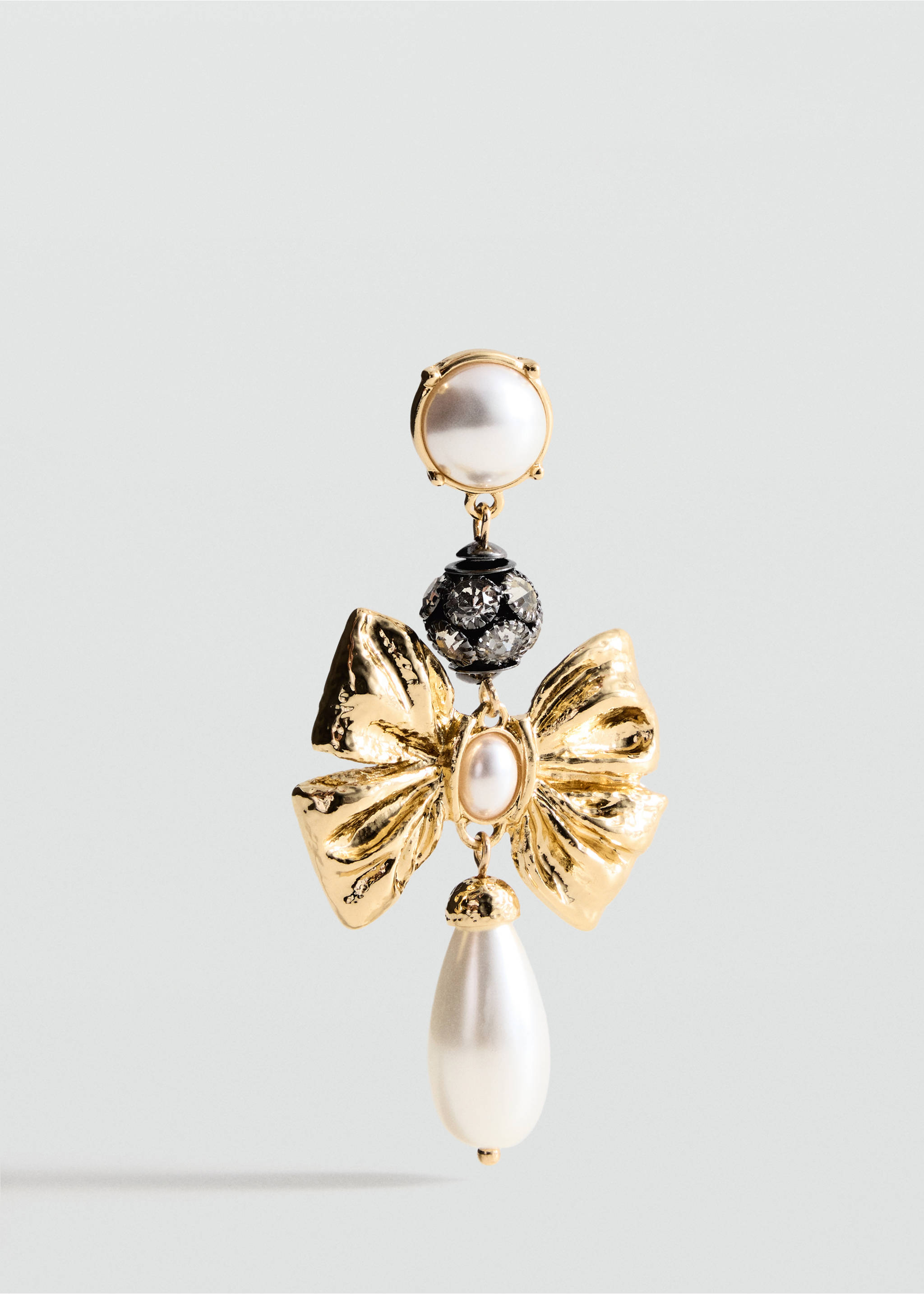 Gold-tone drop earring featuring a faux pearl, pave bead, and a textured bow., Gold. Ref: 37037795-00.