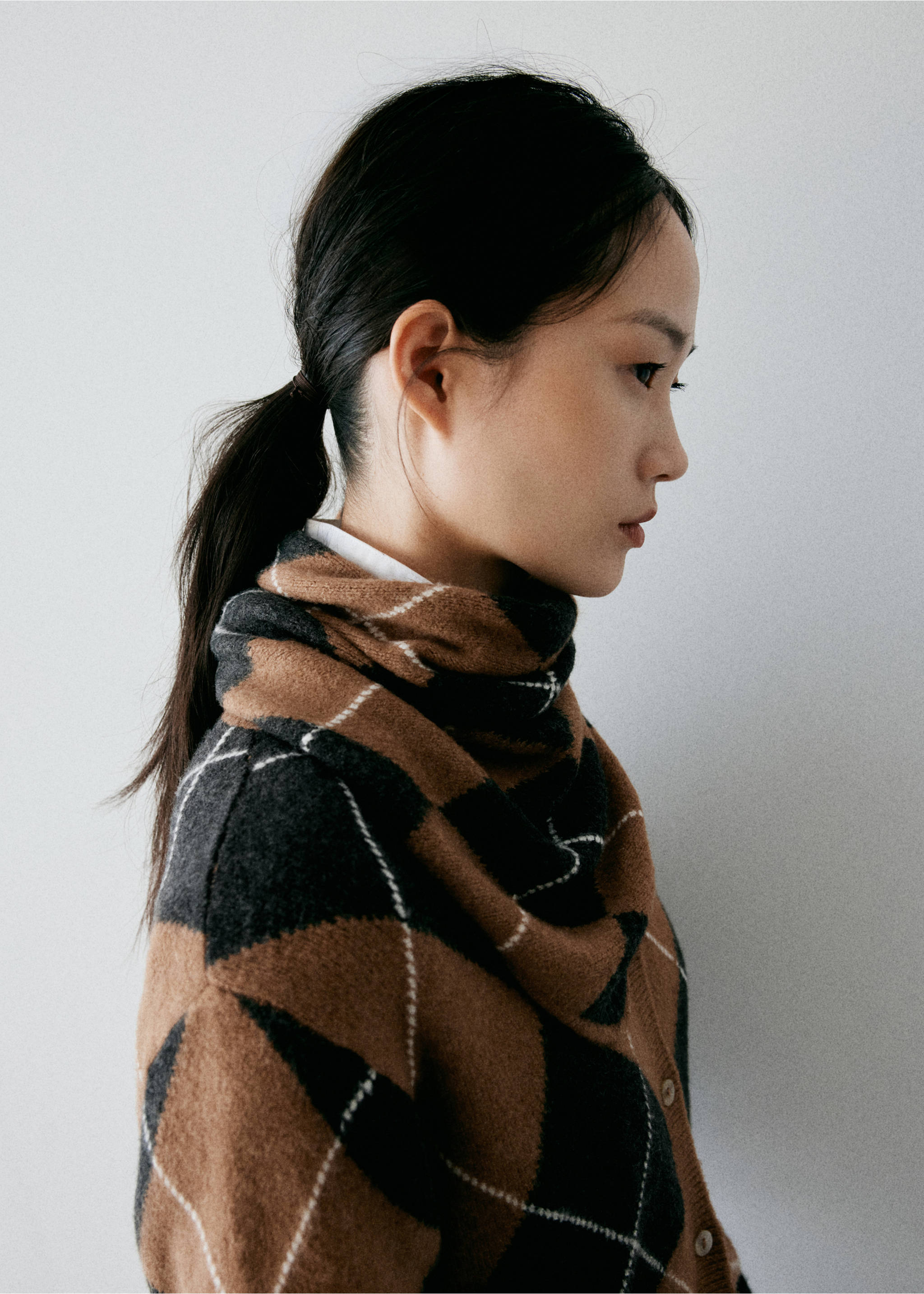 Brown, black, and dark grey argyle check cardigan with a wrapped neckline., Medium Brown. Ref: 37037797-01.