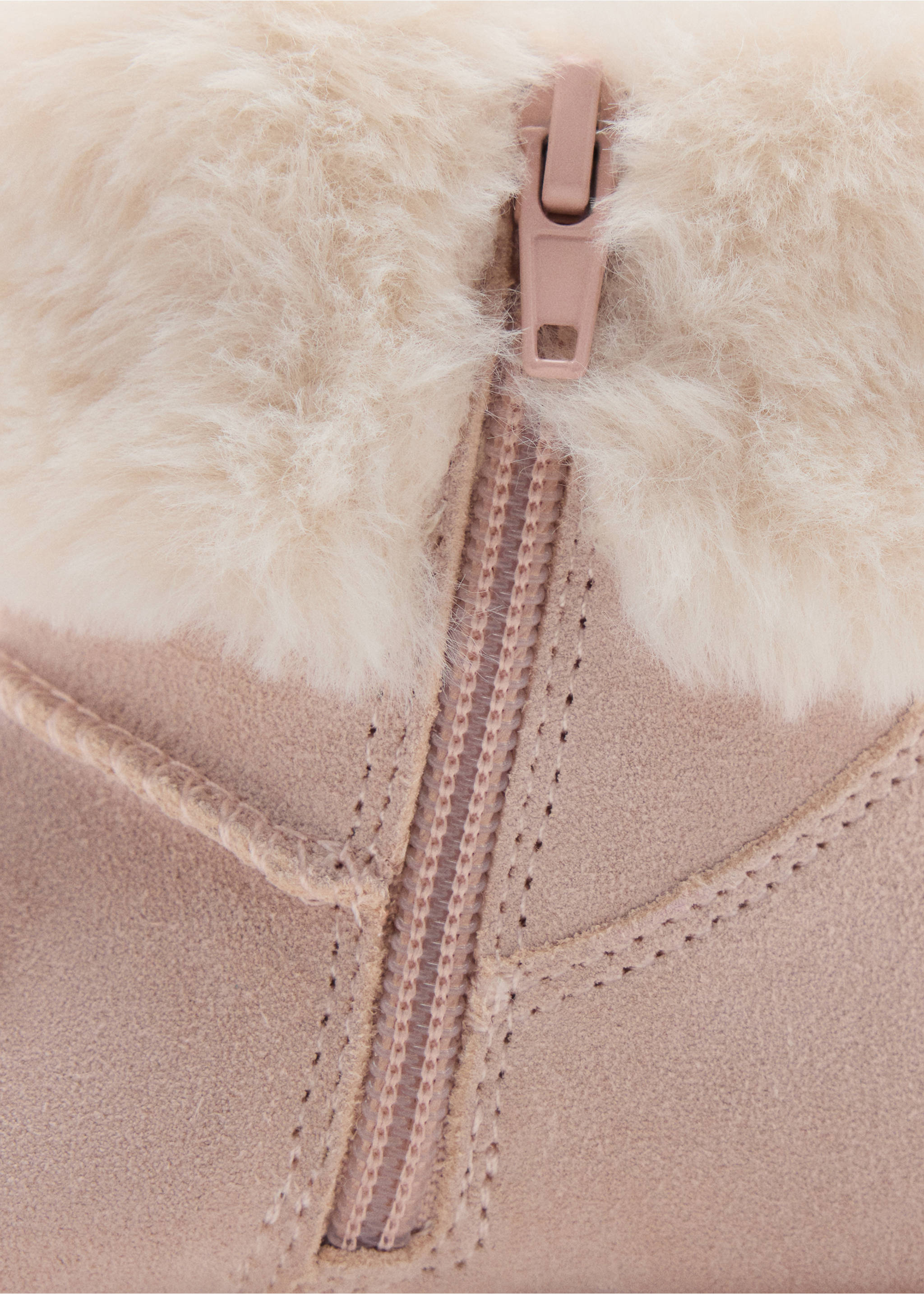 Pink boot detail showing side zipper and cream faux-fur cuff., Pastel Pink. Ref: 37037799-00.