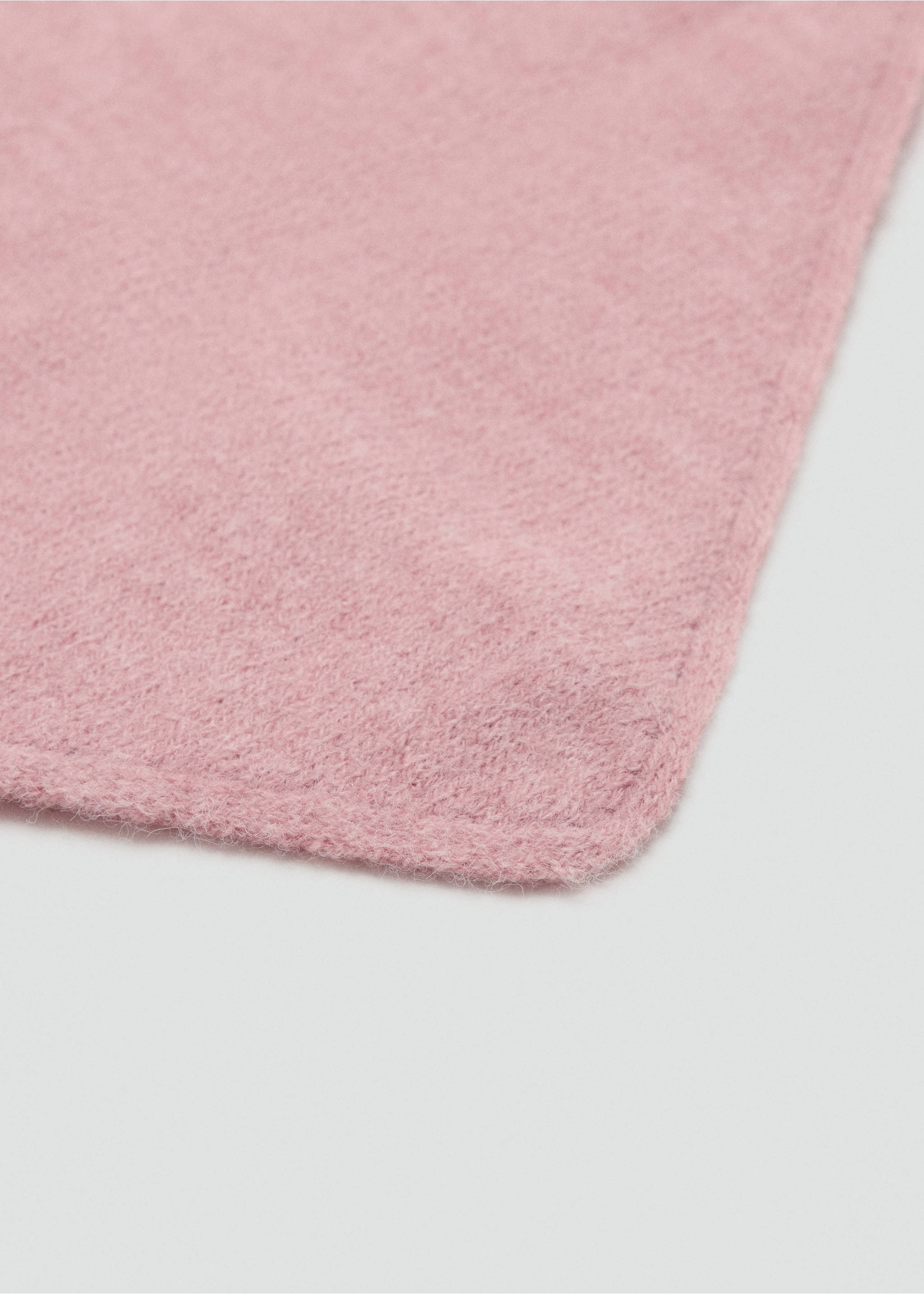 Close-up of a soft pink scarf corner showing textured fabric., Pale Pink. Ref: 37037808-00.
