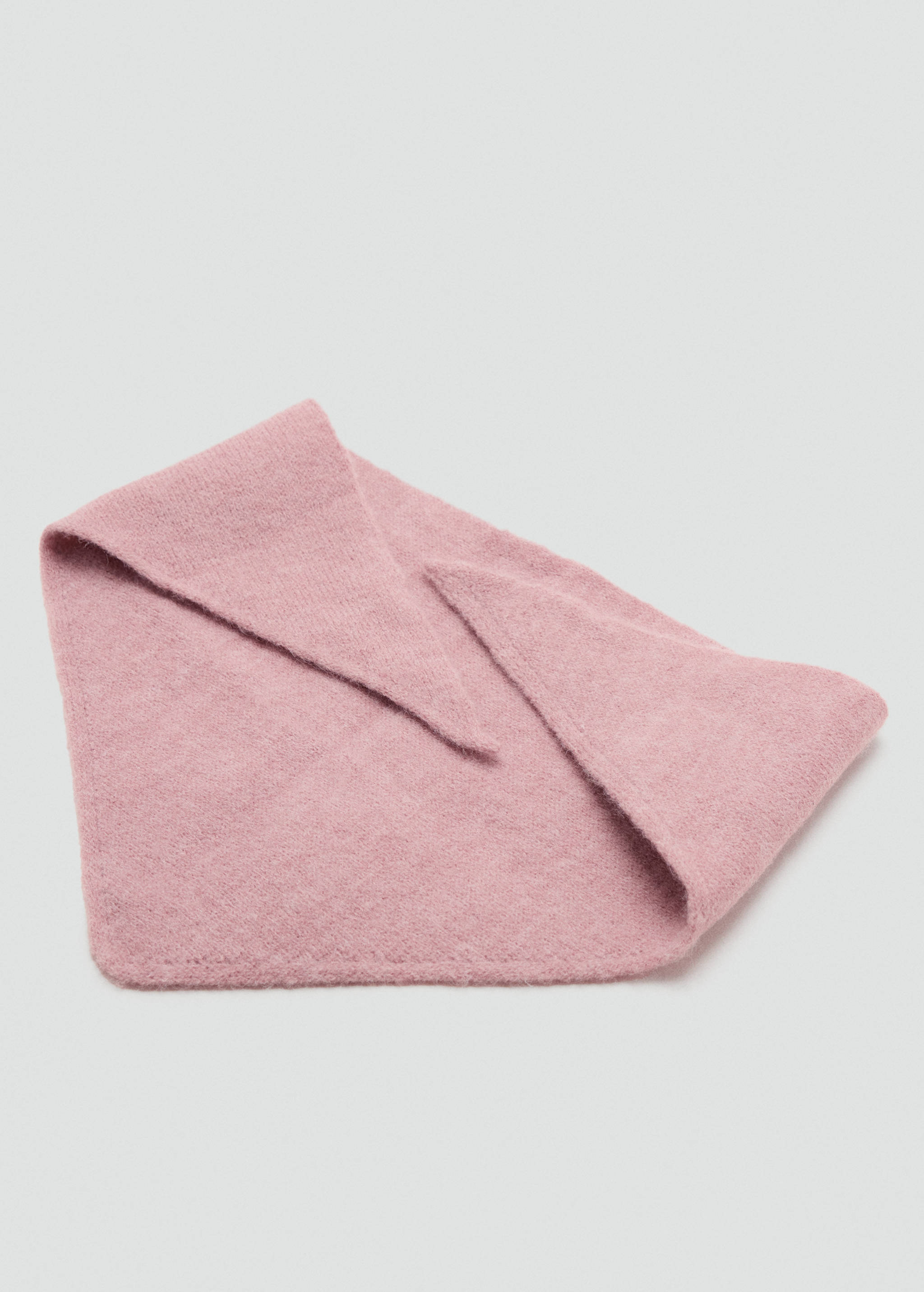 Pink knitted scarf with pointed ends in a soft textured finish.