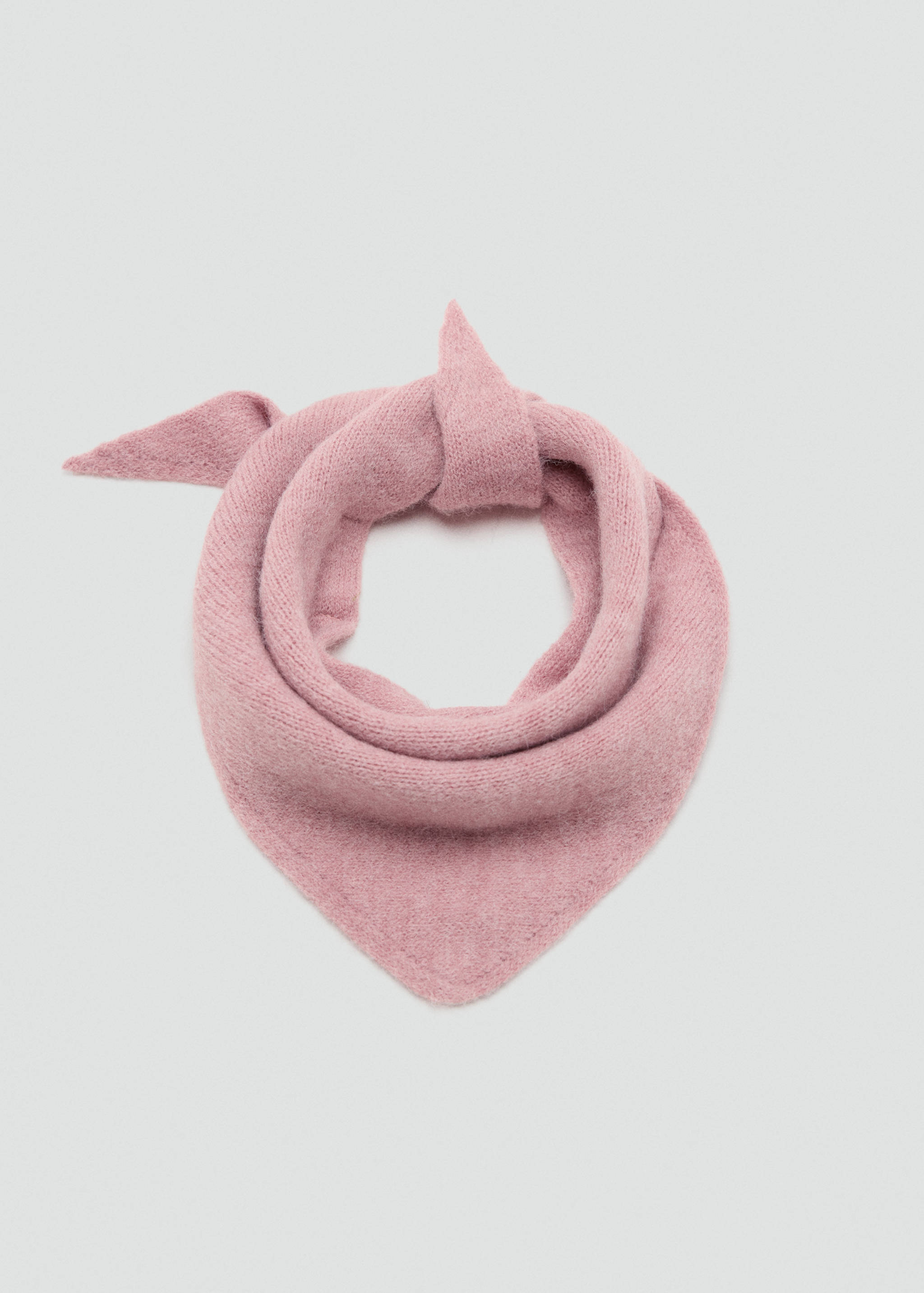Pink knitted scarf in a soft, textured design.