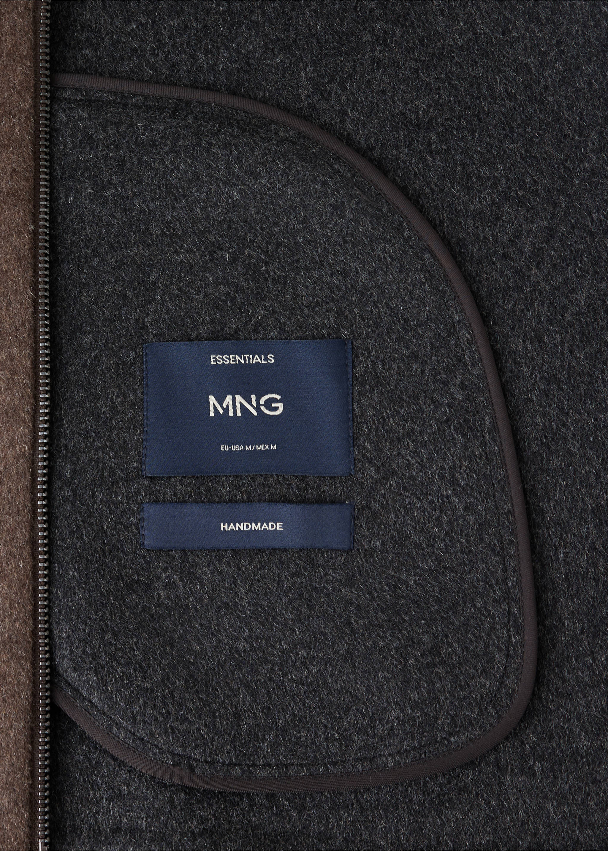 Grey jacket fabric detail showing interior label and piped pocket., Chocolate. Ref: 37037886-00.