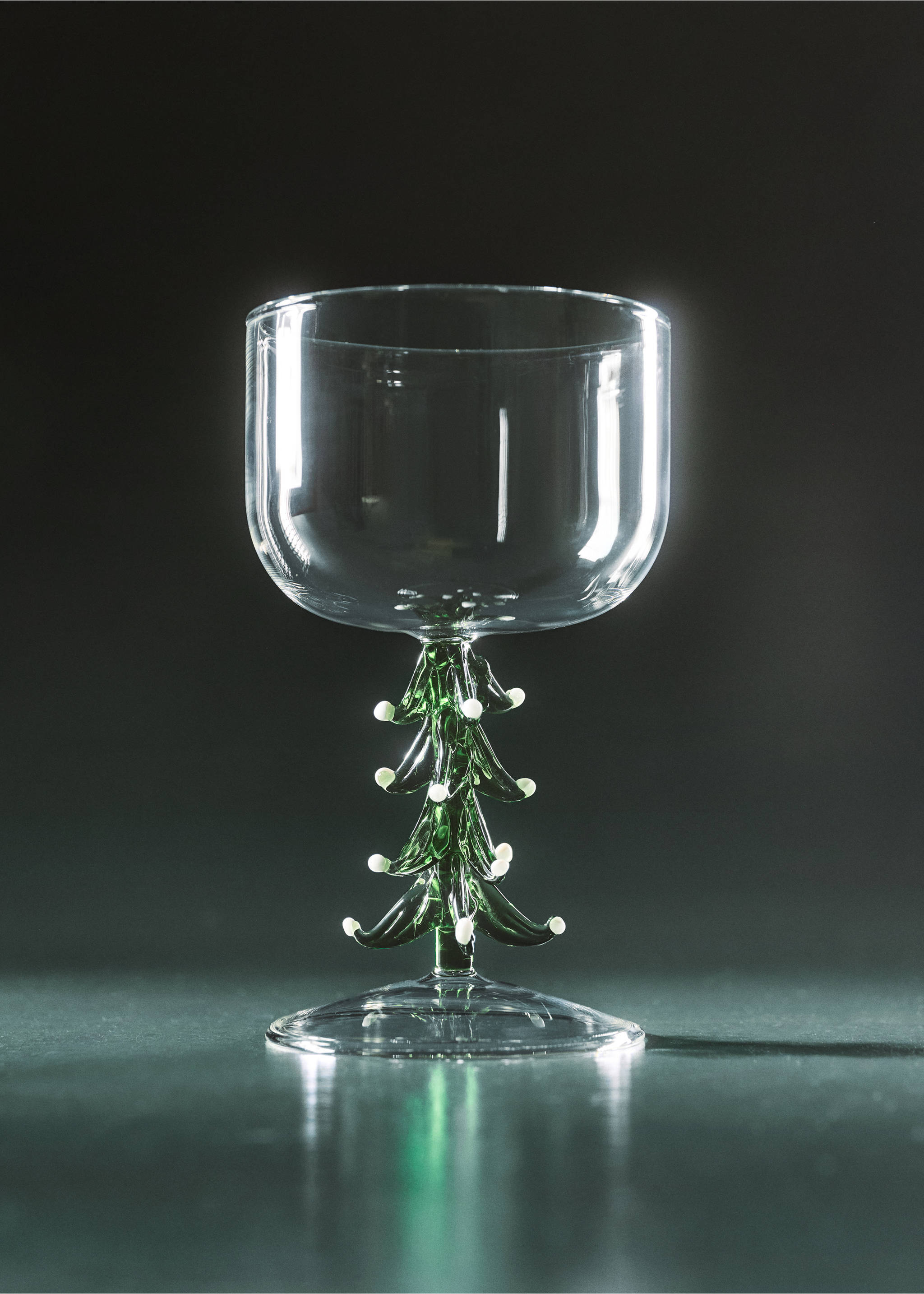 Clear glass goblet with a decorative green Christmas tree stem adorned with white dots., Forest Green. Ref: 37037893-00.