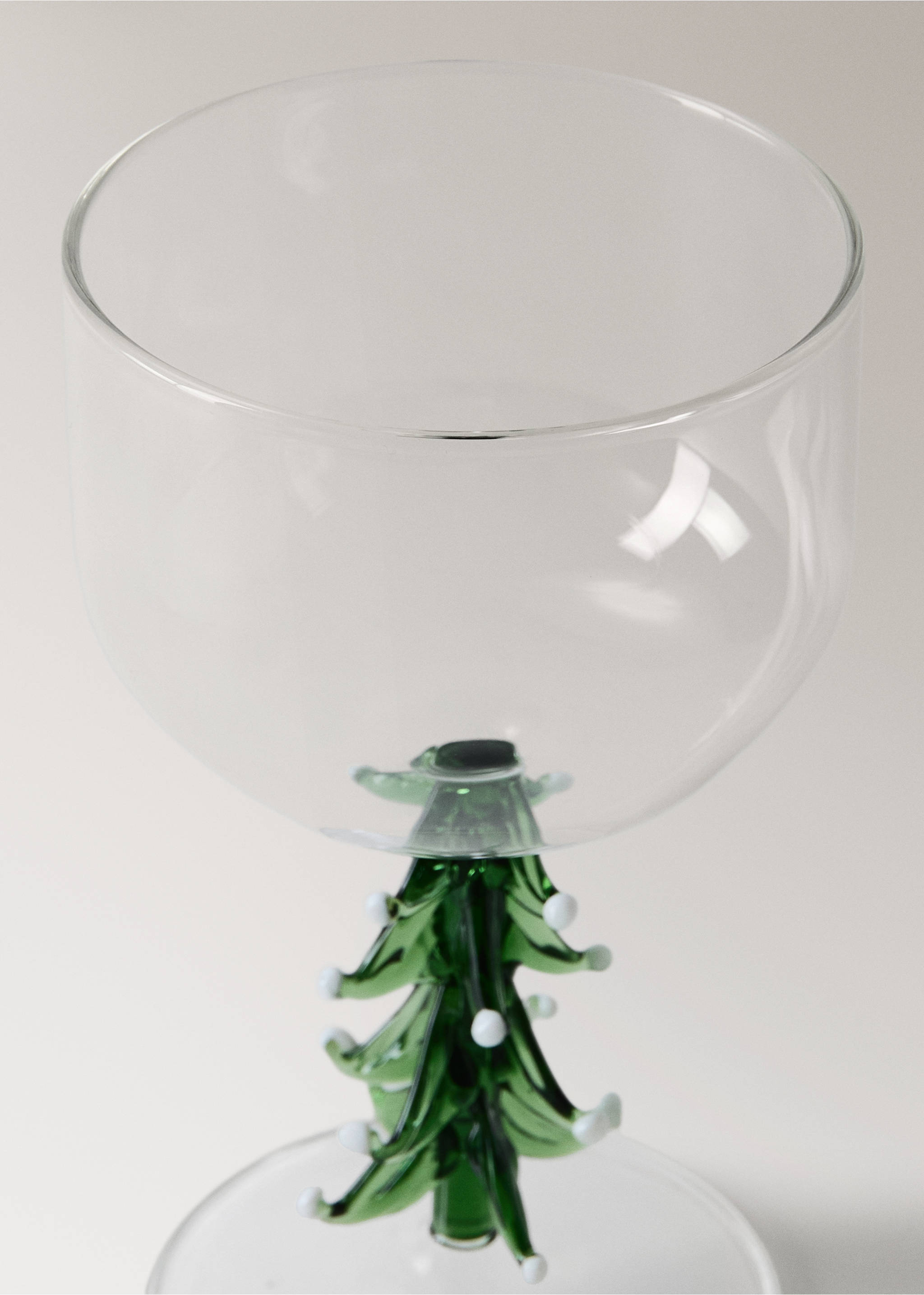 Clear glass goblet with a decorative green Christmas tree stem., Forest Green. Ref: 37037893-00.