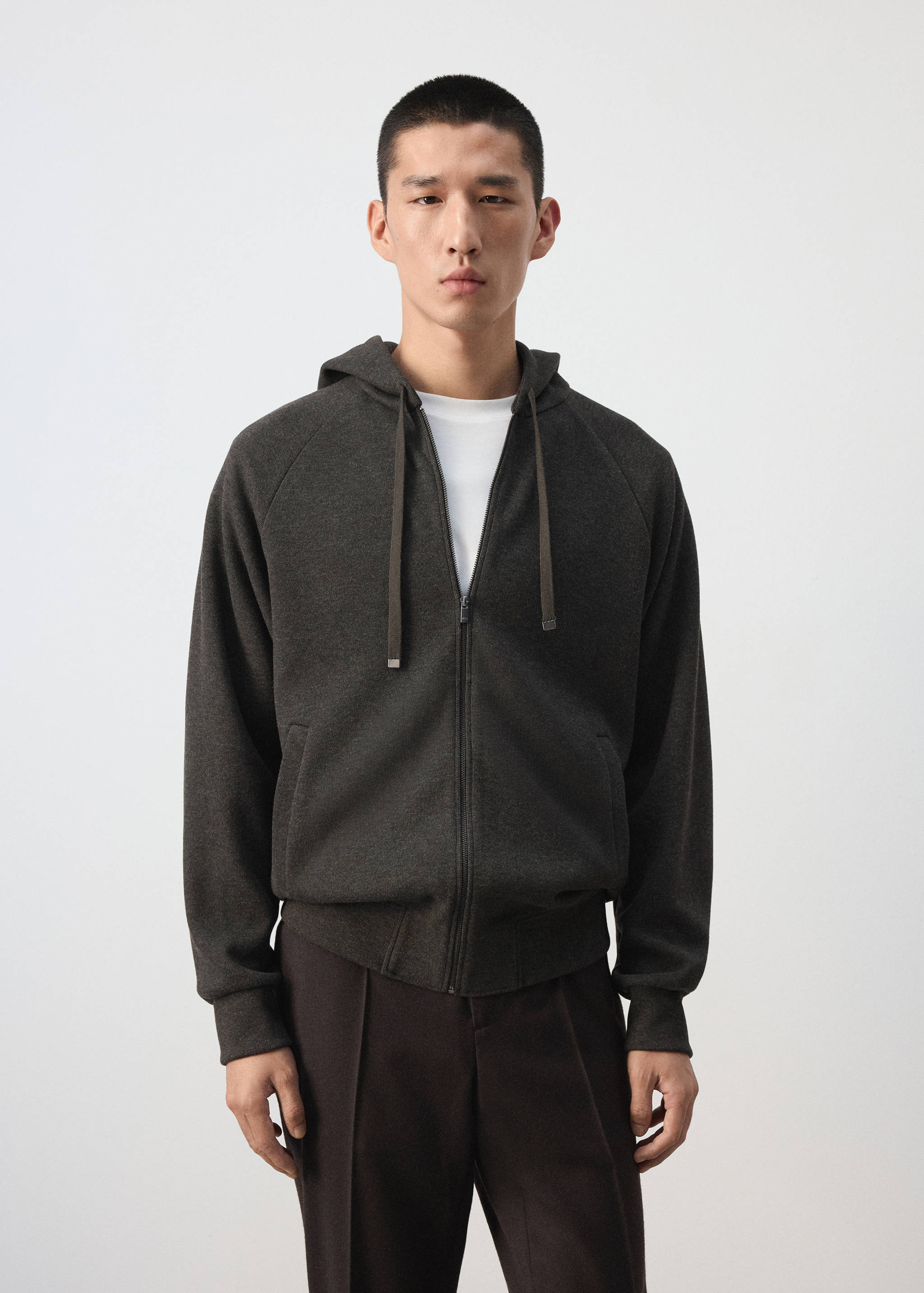 Dark grey zip-up hooded sweatshirt with ribbed trims.