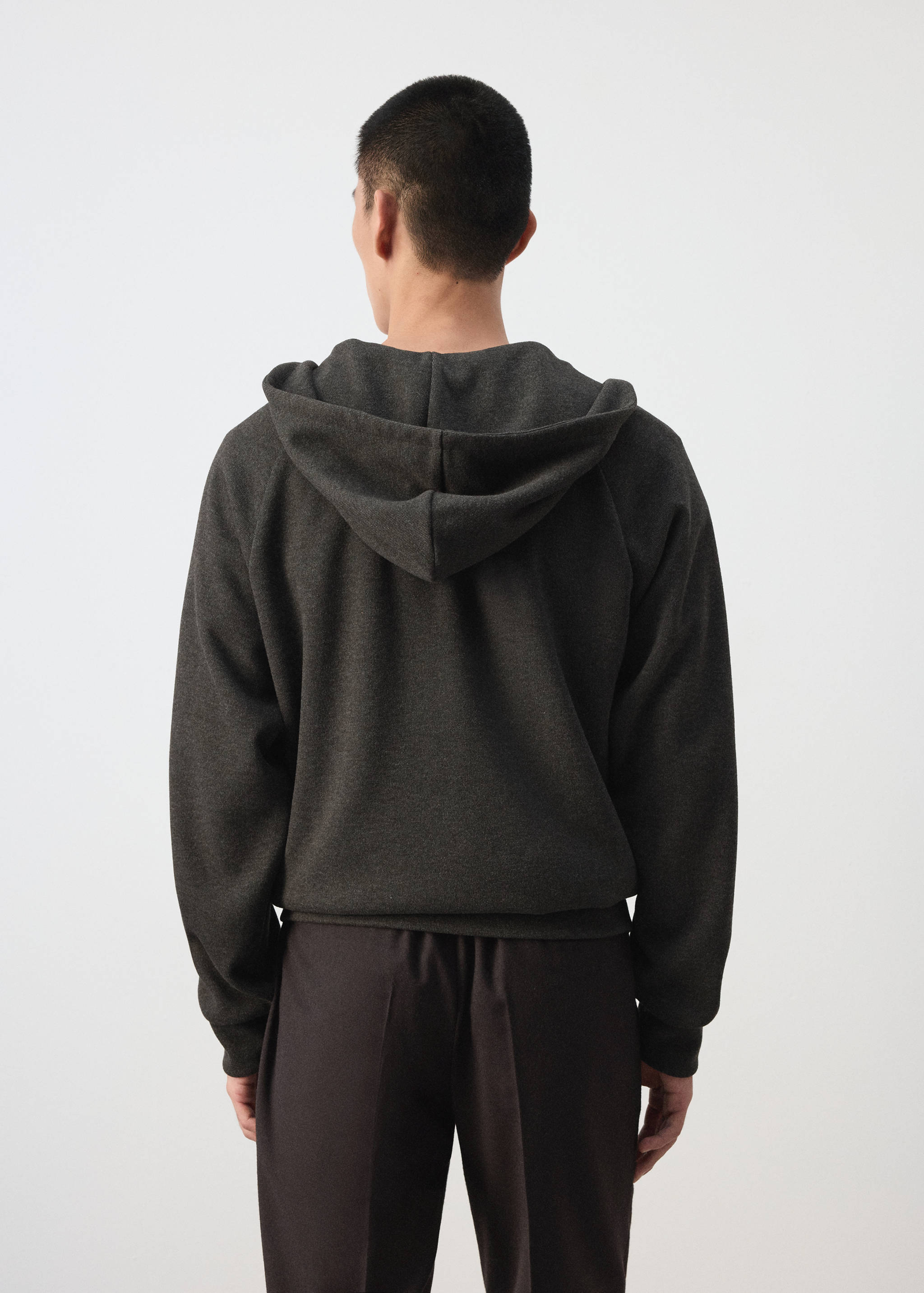 Back view of a dark grey hooded sweatshirt.