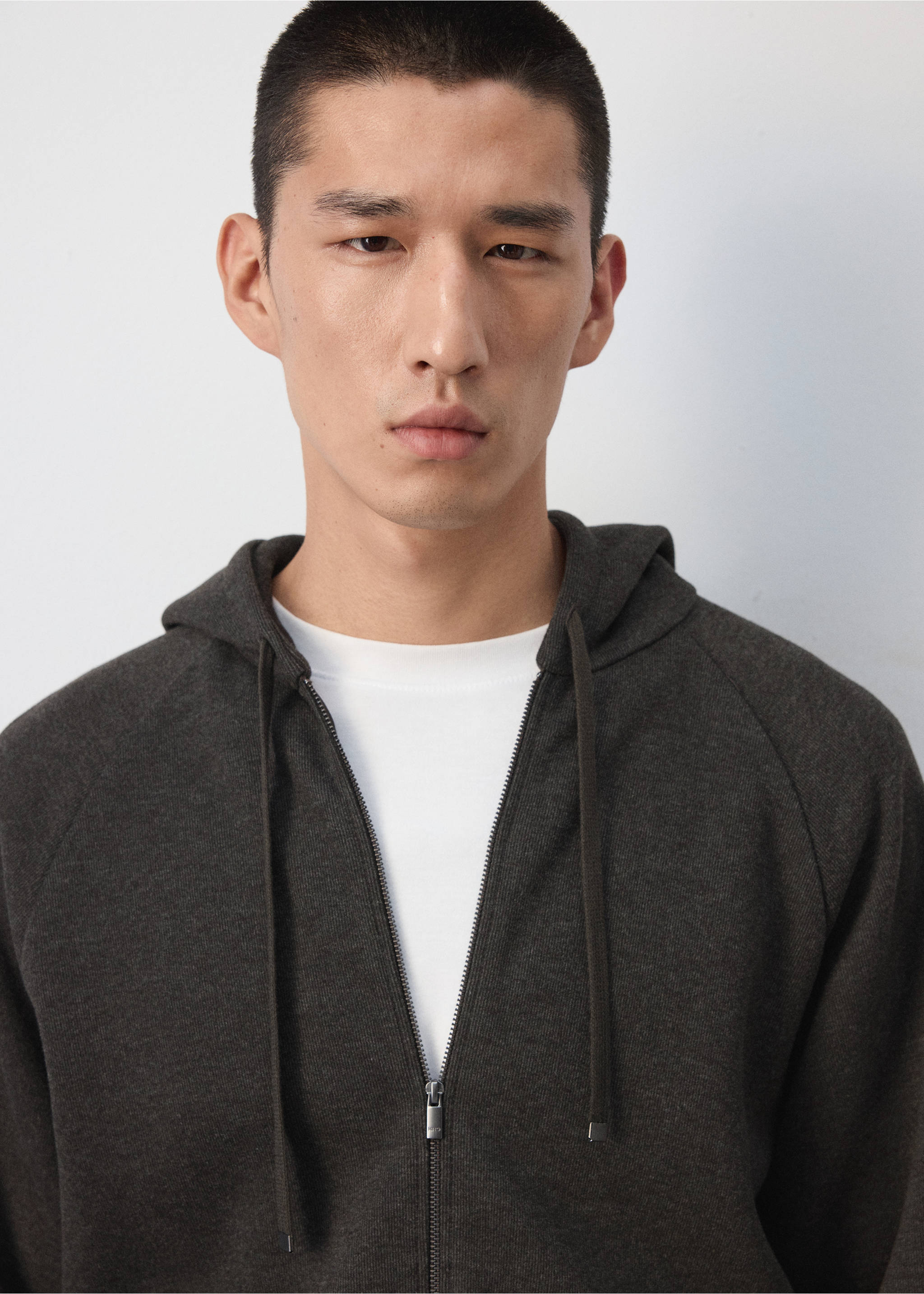 Dark grey zip-up hoodie with a drawstring hood and white t-shirt underneath., Brown. Ref: 37037899-00.