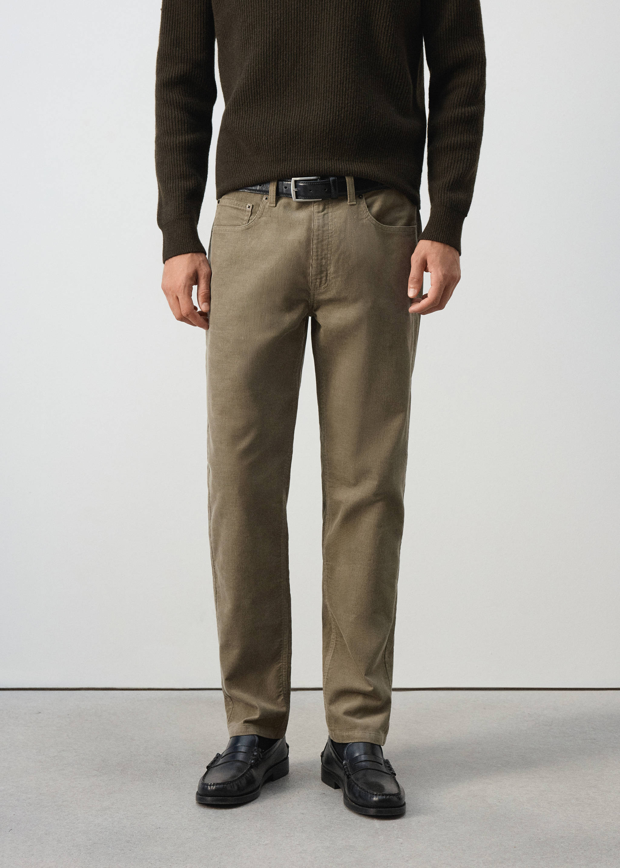 Khaki straight-leg trousers with belt loops and front pockets.