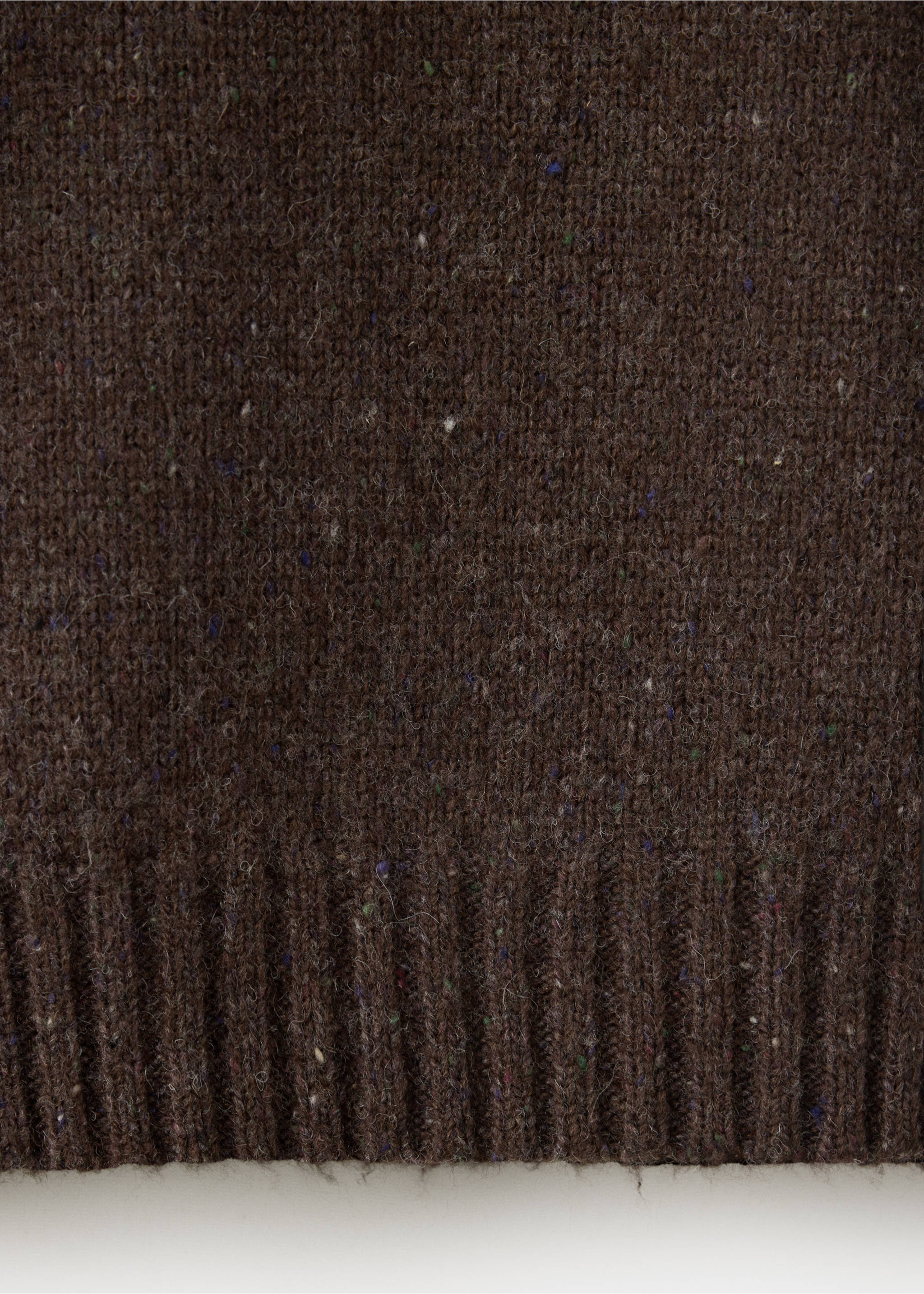 Close-up of a brown knit jumper fabric showing texture and ribbed hem., Chocolate. Ref: 37037910-00.