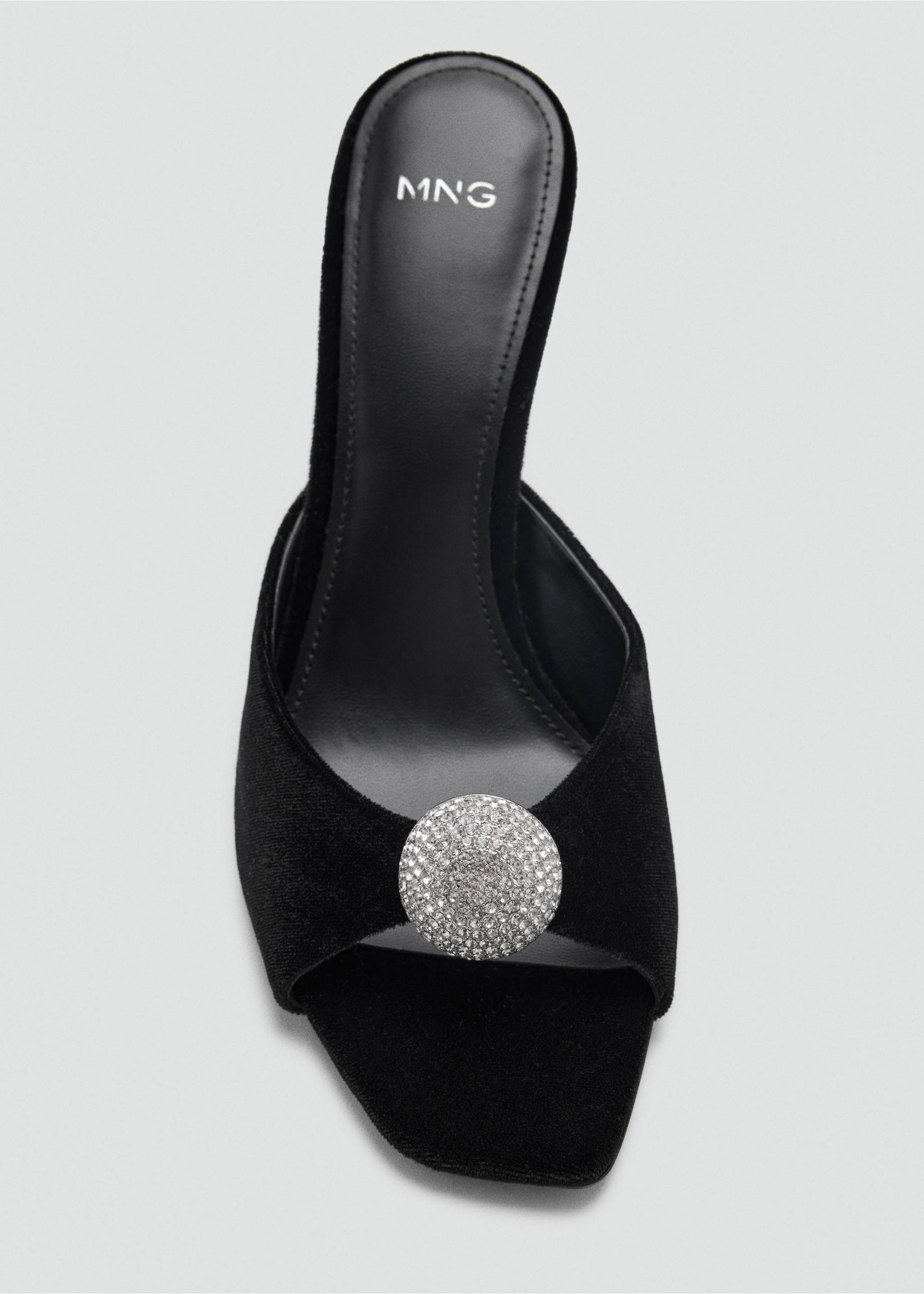 Black velvet sandal with an open square toe and a large rhinestone buckle., Black. Ref: 37037928-00.