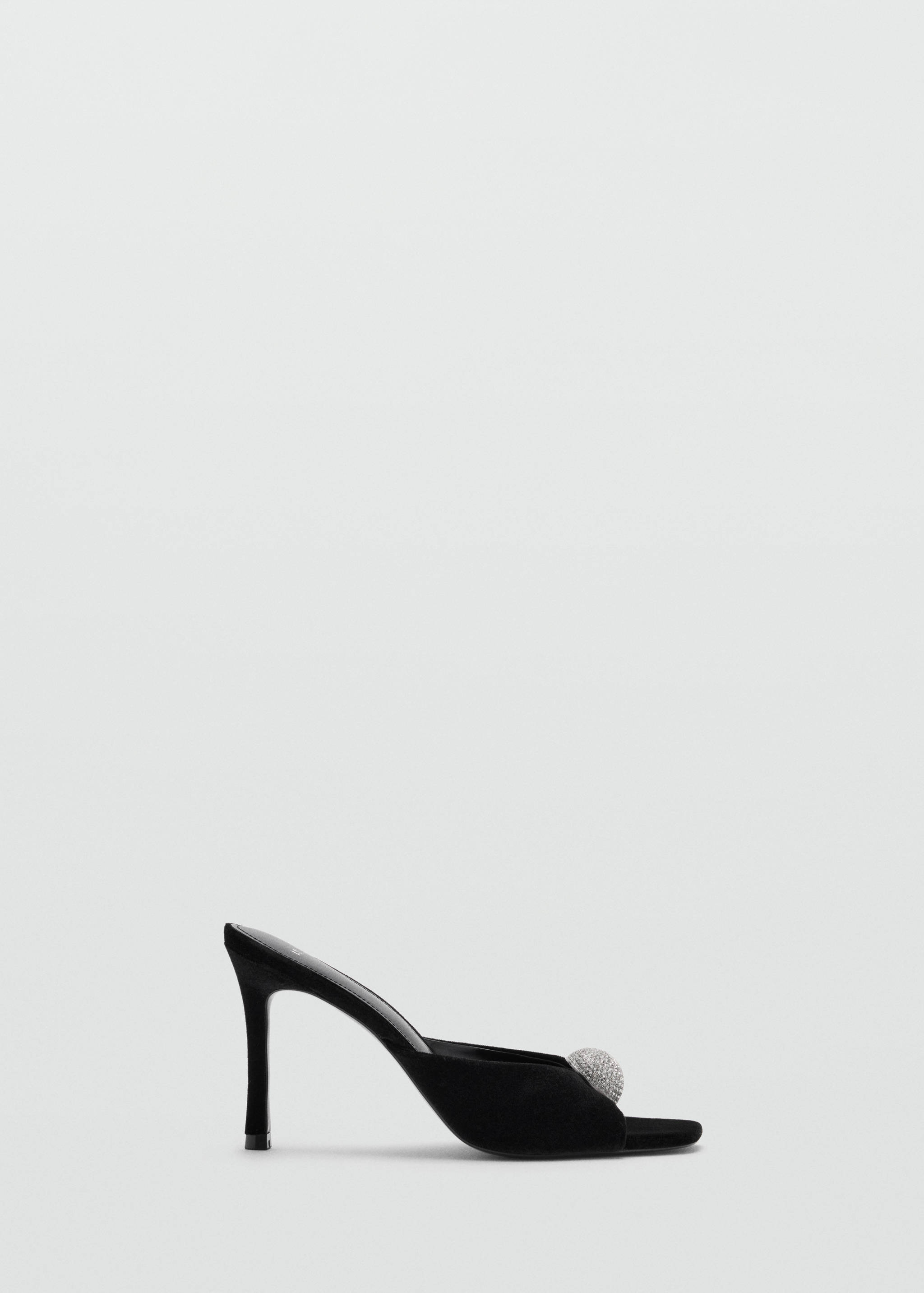 Black heeled sandal with open toe and rhinestone embellishment.
