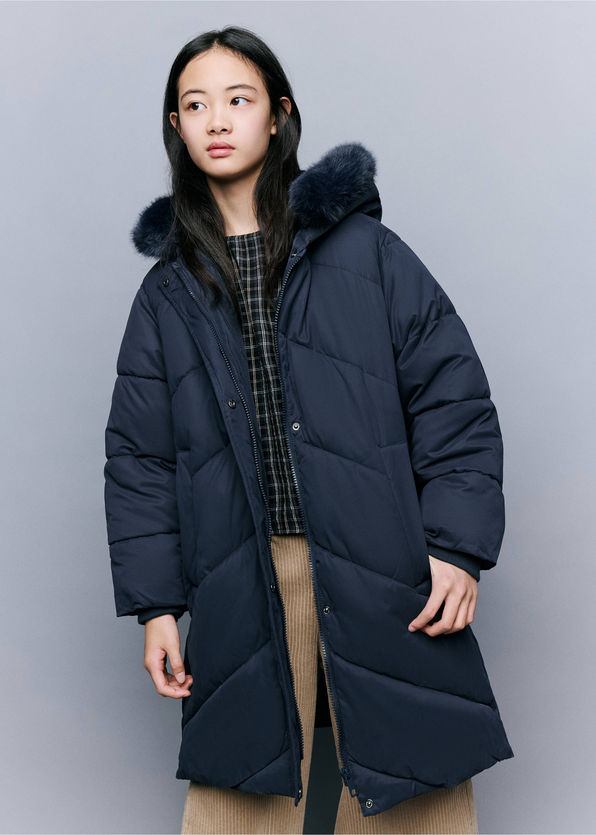 Navy blue quilted anorak with a faux-fur trimmed hood., Navy. Ref: 37038262-00.