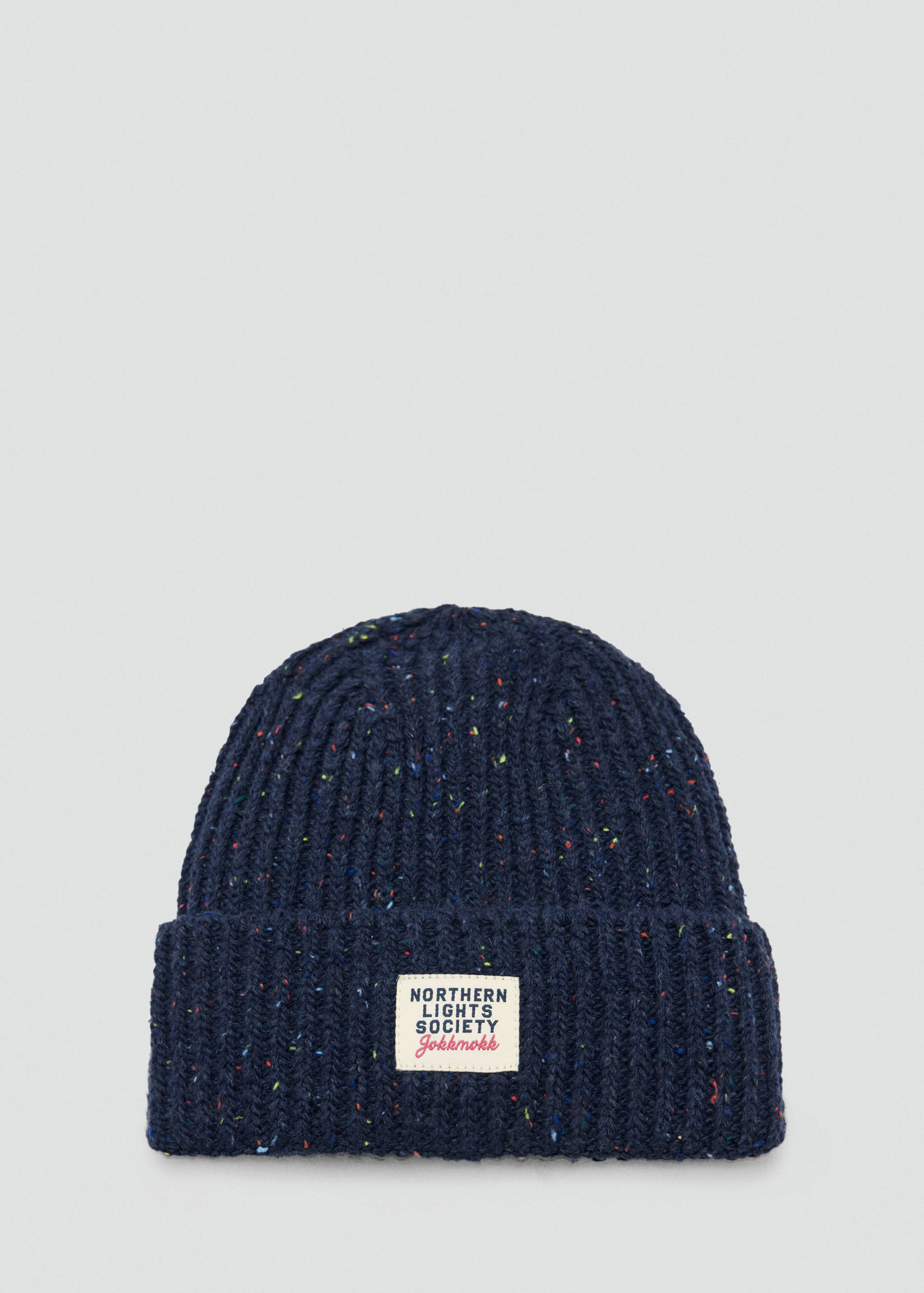 Navy blue speckled ribbed knit beanie with a folded brim and a branded front patch.