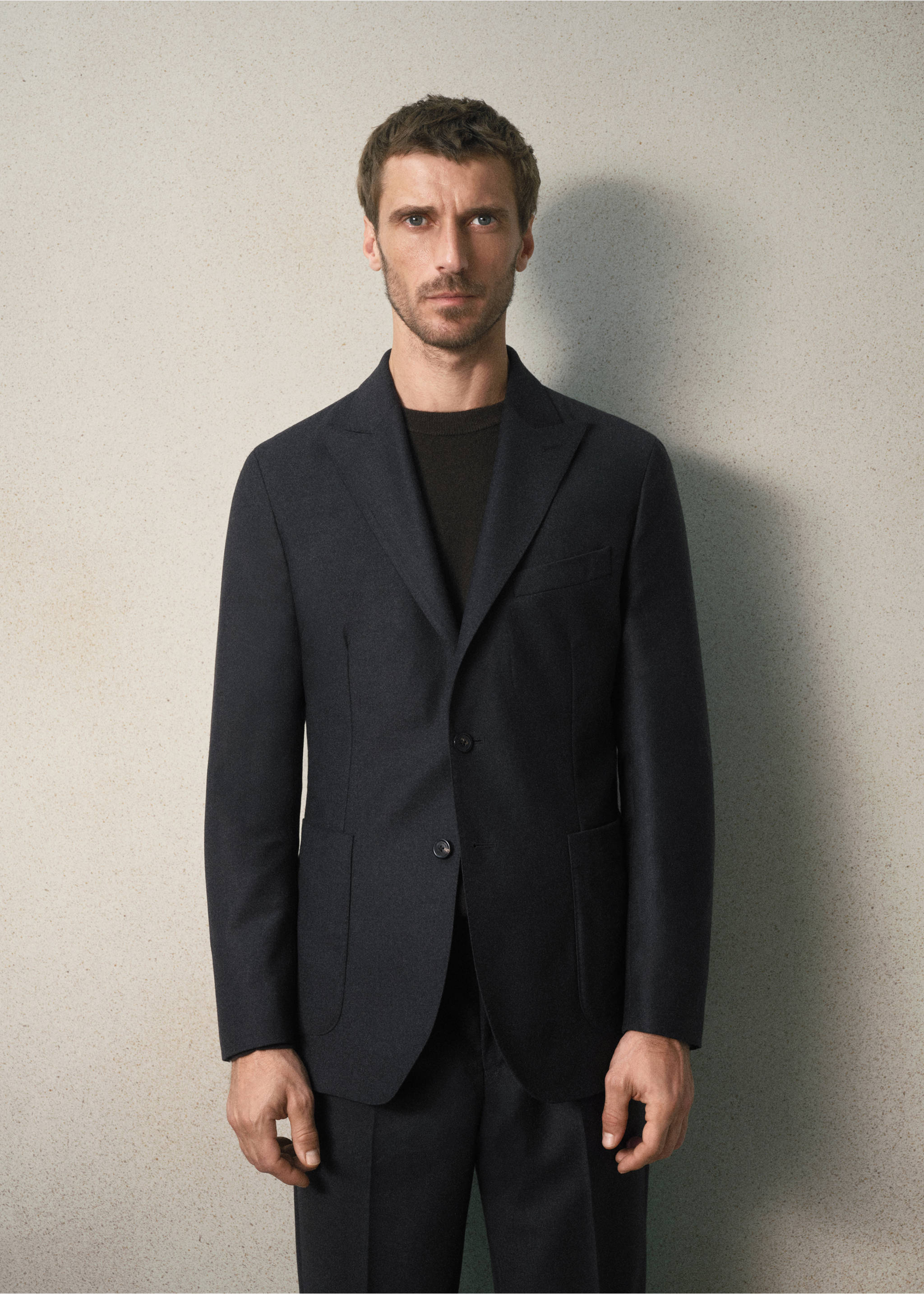 Dark navy blue blazer with notched lapels and two front buttons., Charcoal. Ref: 37038285-00.