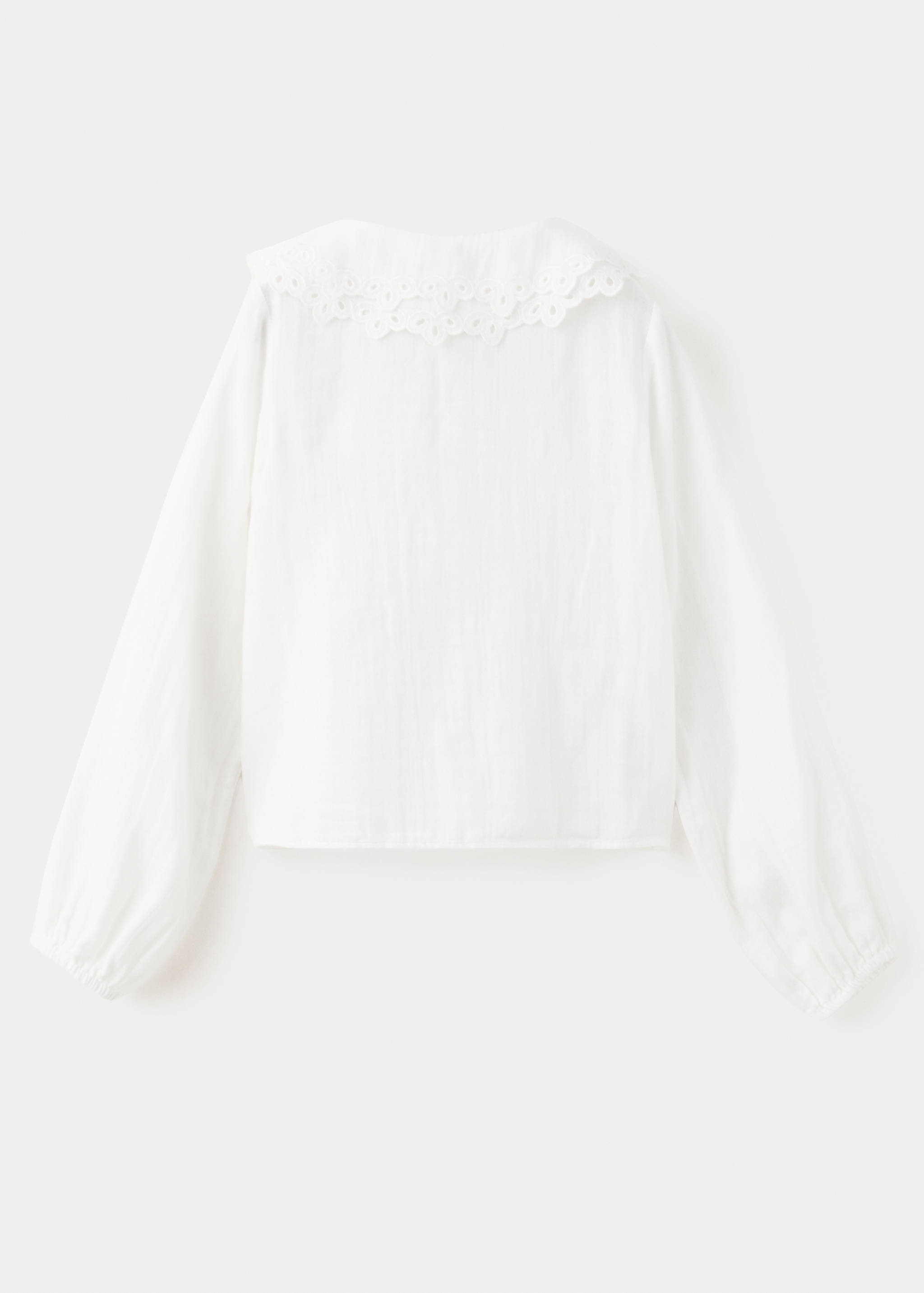CAMISA BLANCA - Reverso del artículo