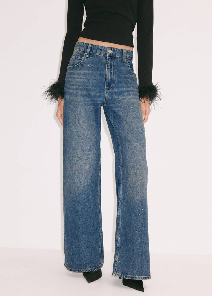 Shiny wide-leg jeans by Mango