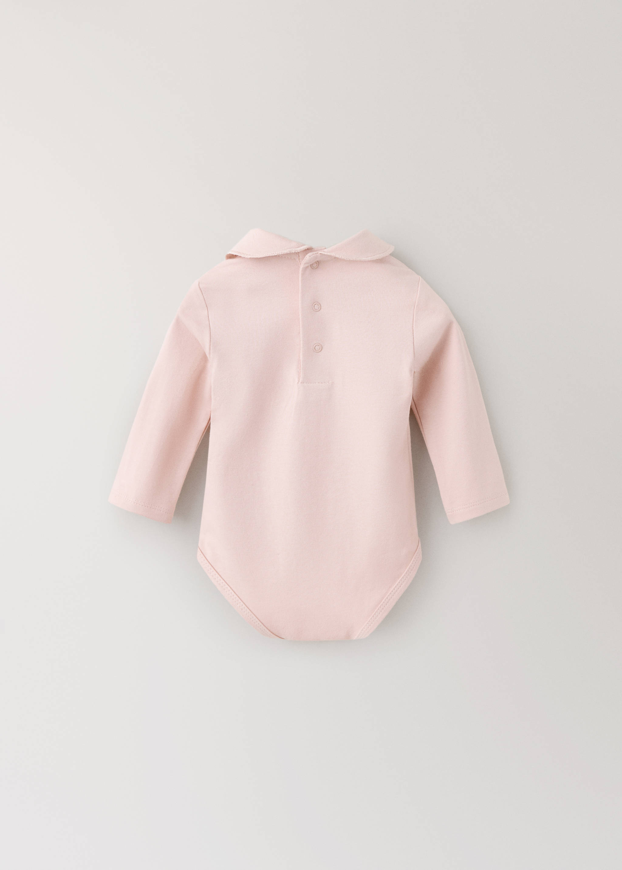 Pink baby bodysuit with long sleeves, Peter Pan collar and back button placket